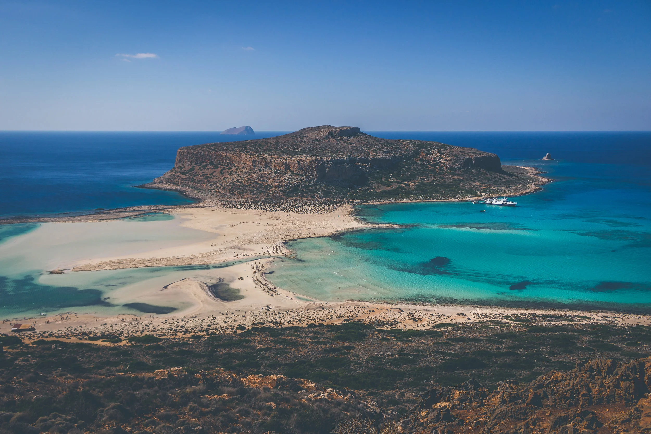 Yacht Cruise to Balos • A cruise on a luxury 50 foot Ferreti motor yacht starts from Chania port and in 90 minutes, with a speed of 20-25 knots, takes you to the azure waters of Balos, a world known Cretan landmark and one of most photographed spots on the island. • Reaching the islet of Gramvousa, you can walk up the small path leading to the top and enjoy the stunning view of the Venetian castle and the breathtaking outlook towards the west and the lagoon. • You will swim in the crystal sea away from the crowds and when back on board you will enjoy a light lunch with wine and refreshments. • Heading back towards Chania we will sail around the islet of Theodorou, a reserve for the rare Cretan wild goat, before our return in the old harbor in the evening. Tour Time: Approximately 9 hours Group Size: Available as a private charter for up to 8 people