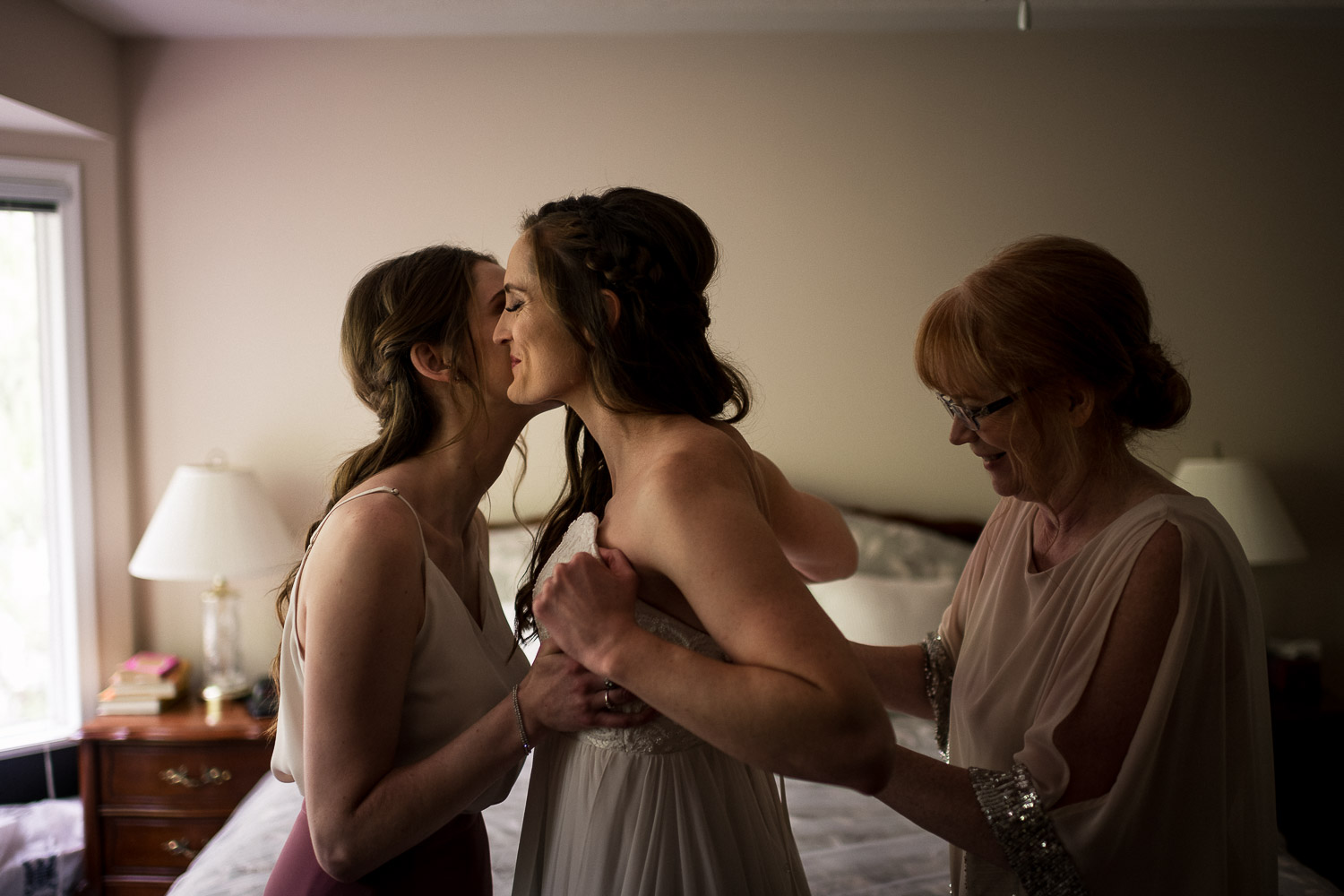 bride getting ready with mom