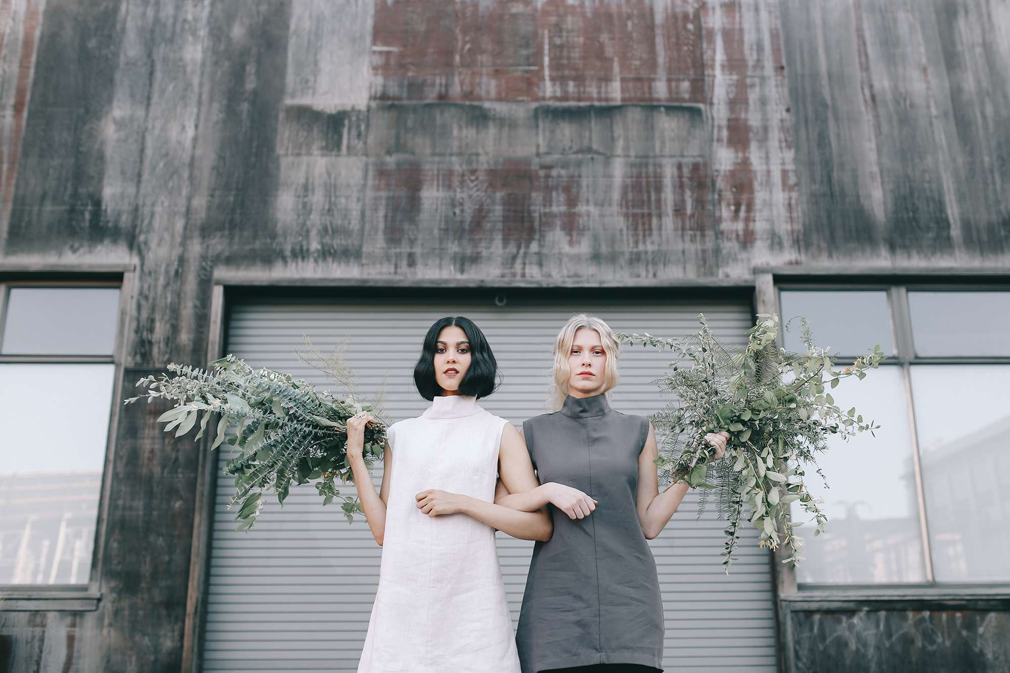 Photography by Diane Villadsen , designed by Joanna Weadon of Mae-Noel , styling by Catherine Franc is, beauty by Tara Marshell , modeled by Annalyse Cordon & Lindsay Knox, greenery by Katie Chirgotis