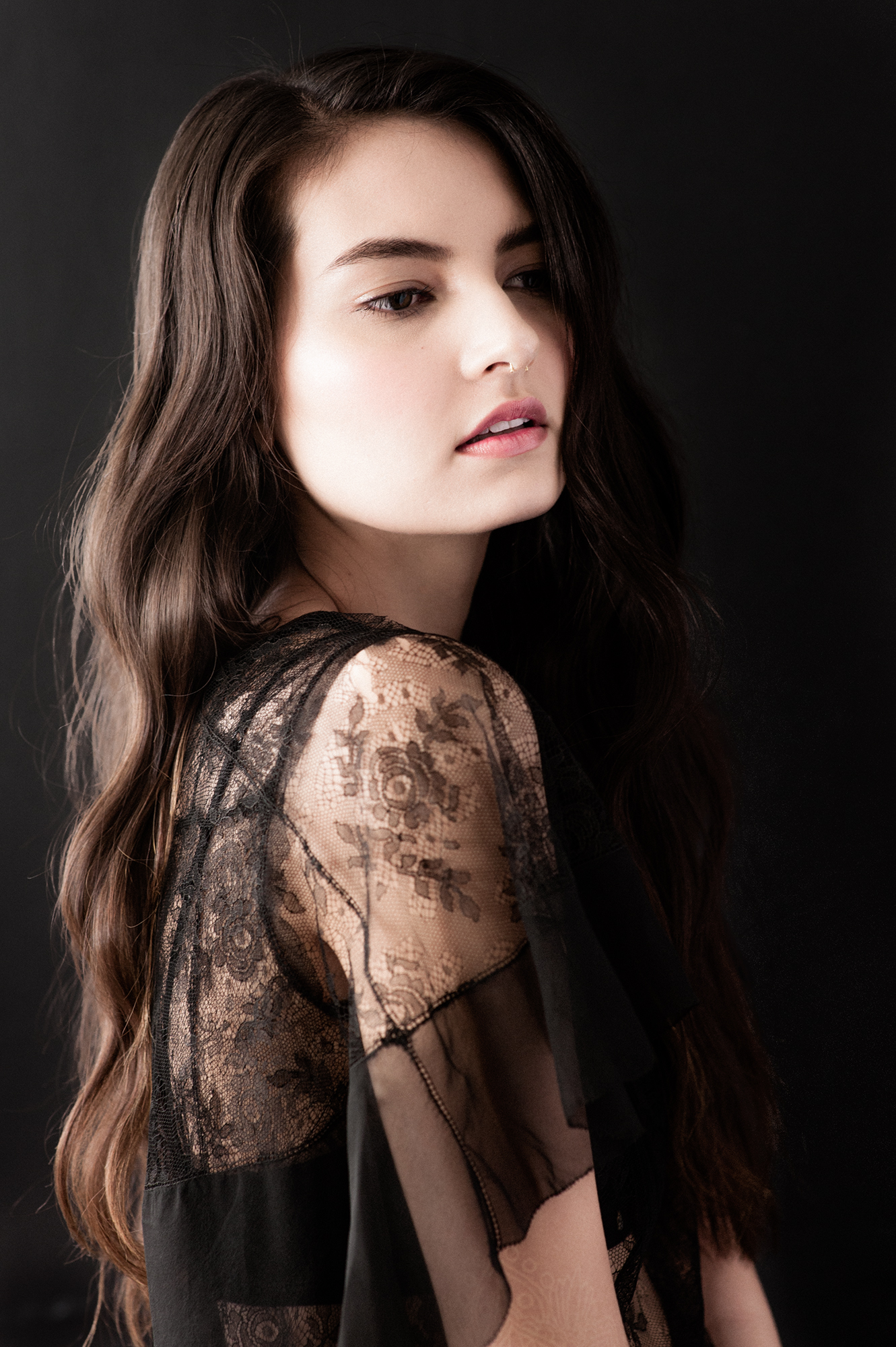 Sydney is wearing a Vintage 1930s Black Lace Dress and Botanica Workshop Aya Longline Bralette.