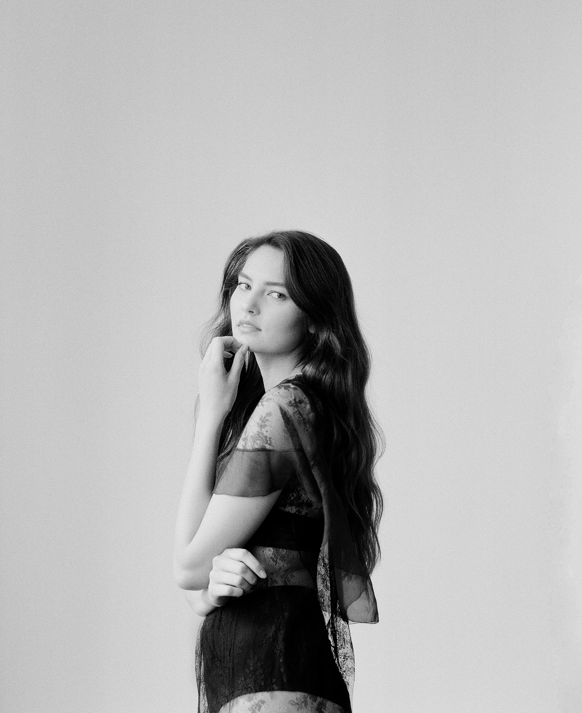 Sydney is wearing a Vintage 1930s Black Lace Dress and Botanica Workshop Aya Longline Bralette.