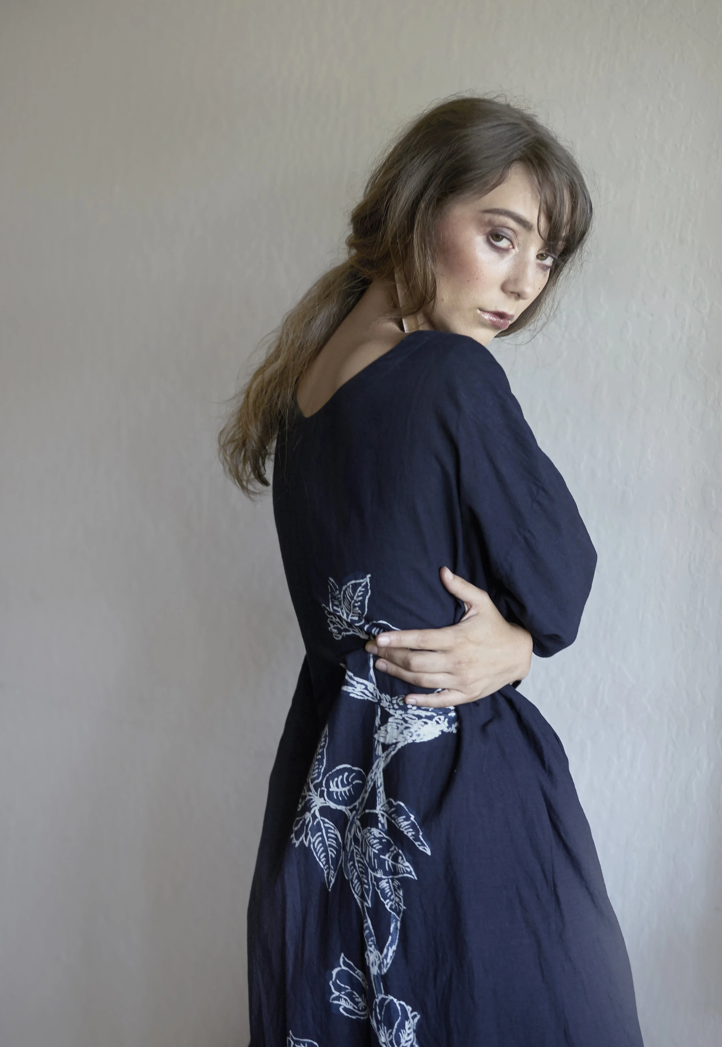 Dress—45R, Earring—Editor's own