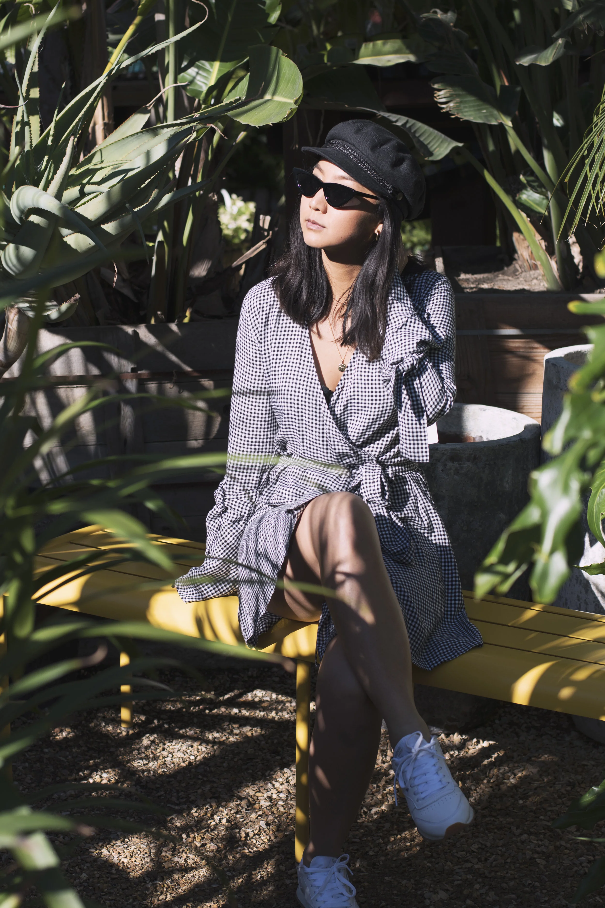 Dress and Coat: Shop Isalis, Hat: Brixton, Sunglasses: Le Specs X Adam Selman, Shoes: Reebok