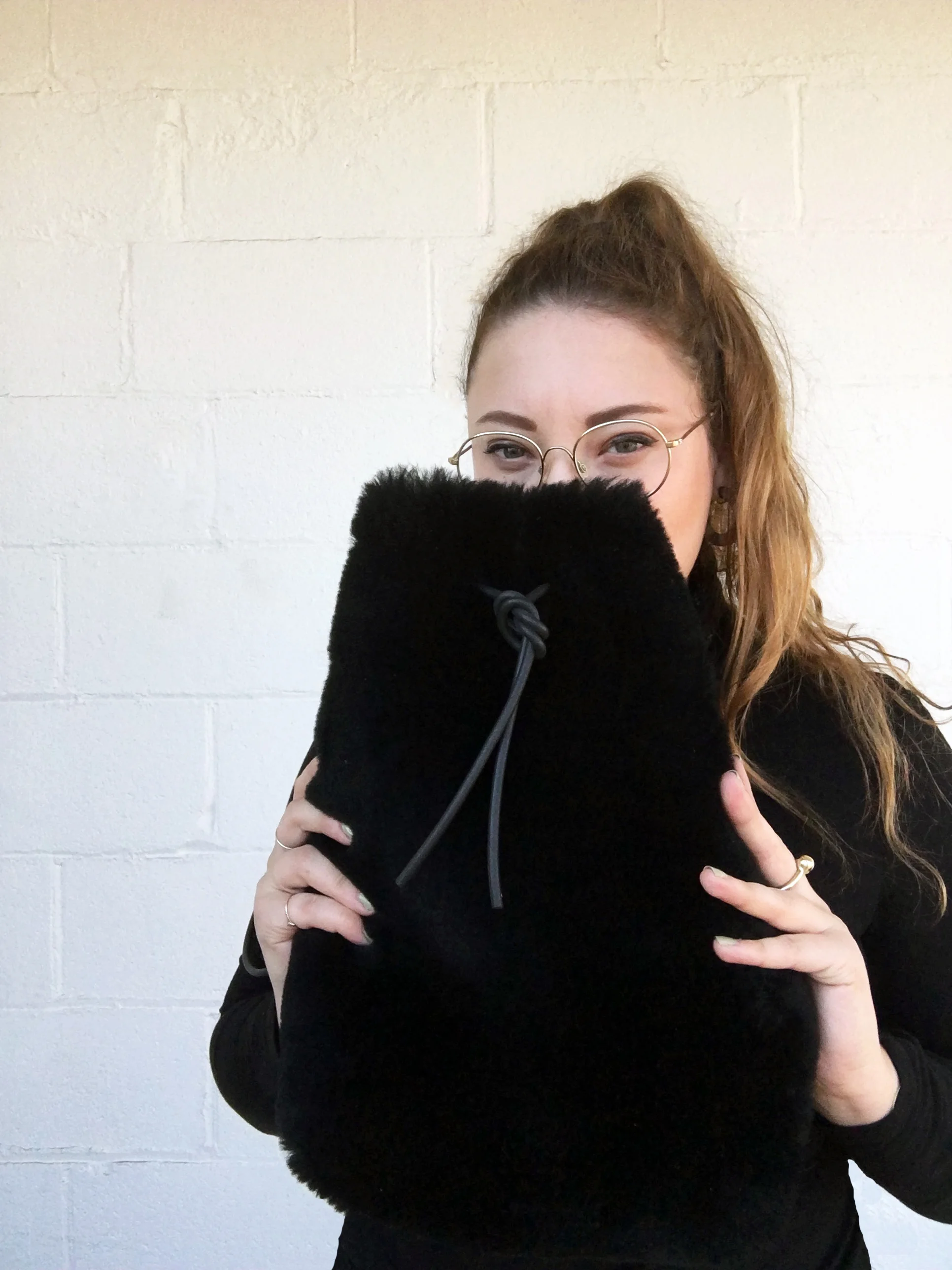 The designer, Hannah Emile with one of her bags.