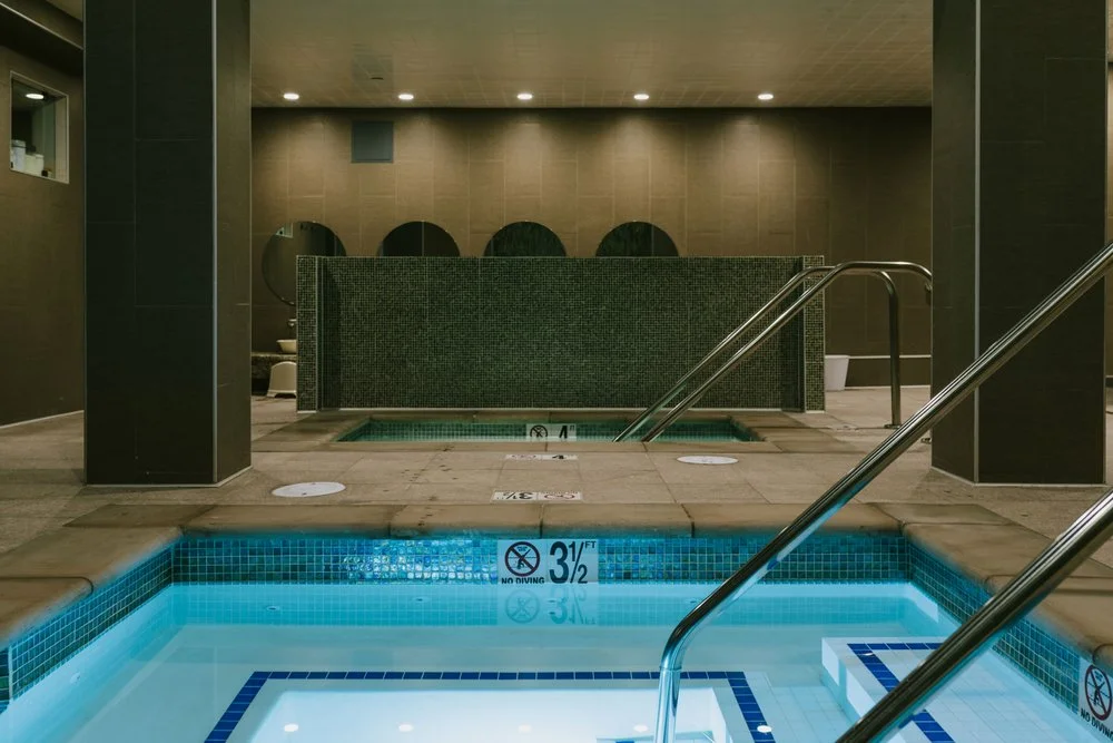 The cold plunge room where you are going to bathe naked with your fellow woman.