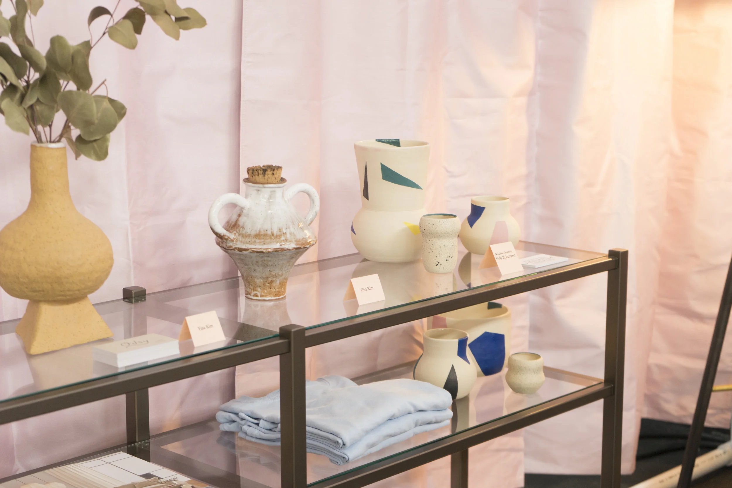 Featuring Yina Kim, Nola Mae Ceramics, and Brixton Console Bookcase .