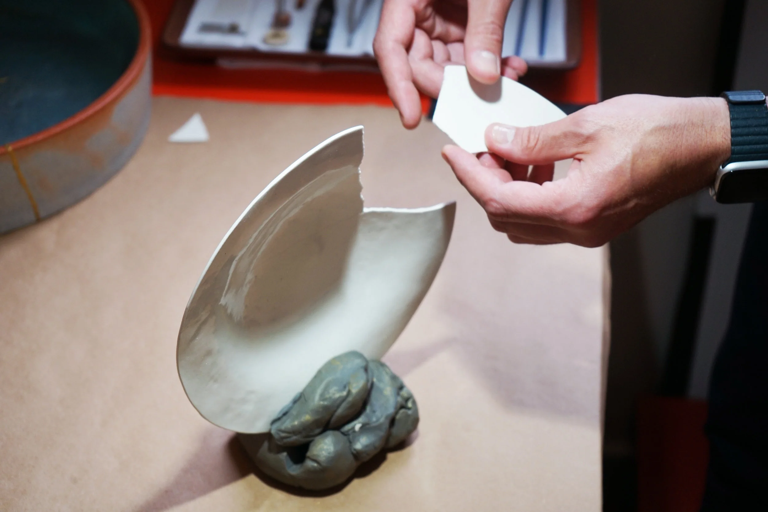 Joe giving us a demo on how he puts the fine china back together with precision.