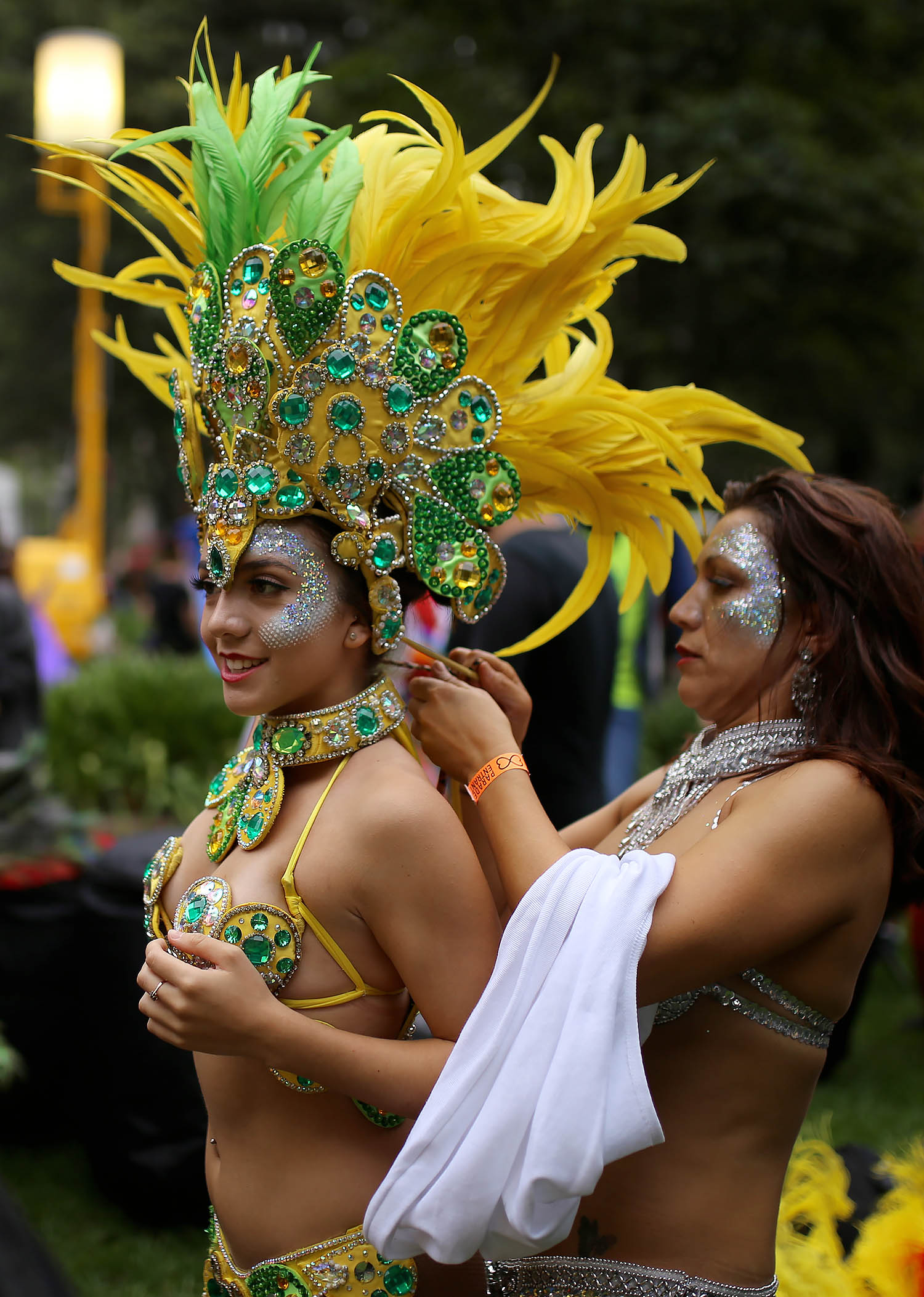  A participant in the annual Sydney Gay and Lesbian Mardi Gras festival prepares her costume in Sydney, Australia. 