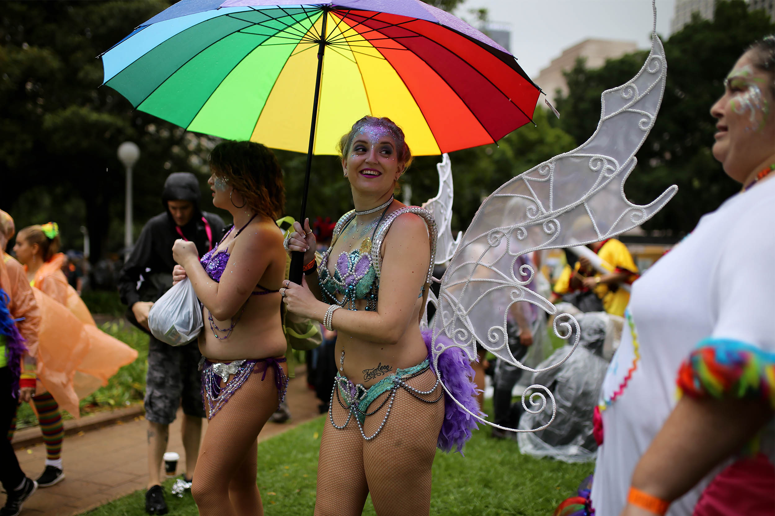  A participant holds a rainbow umbrella during the annual Sydney Gay and Lesbian Mardi Gras festival in Sydney, Australia. 