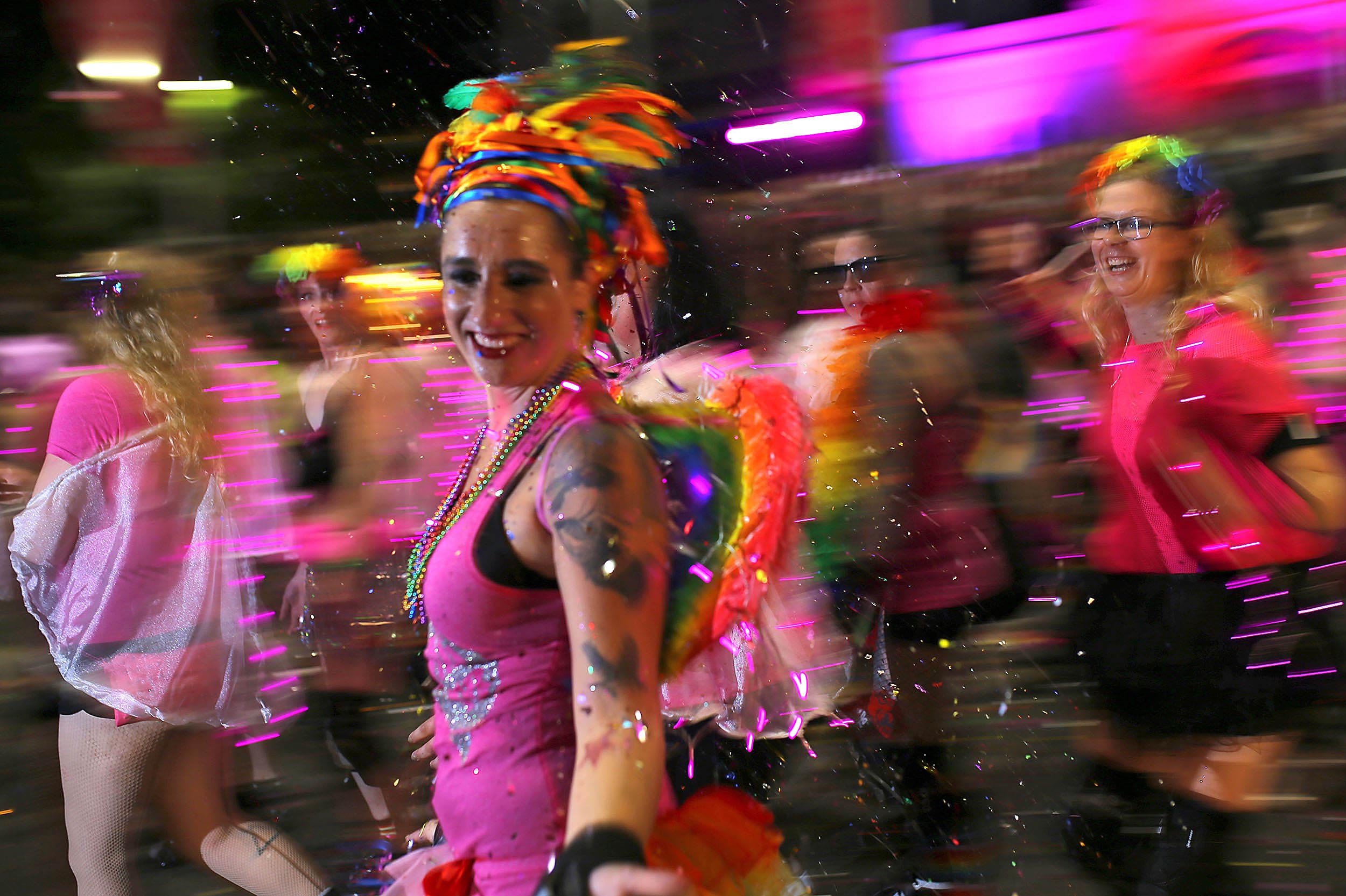  Participants march at the annual Sydney Gay and Lesbian Mardi Gras parade in central Sydney, Australia. 