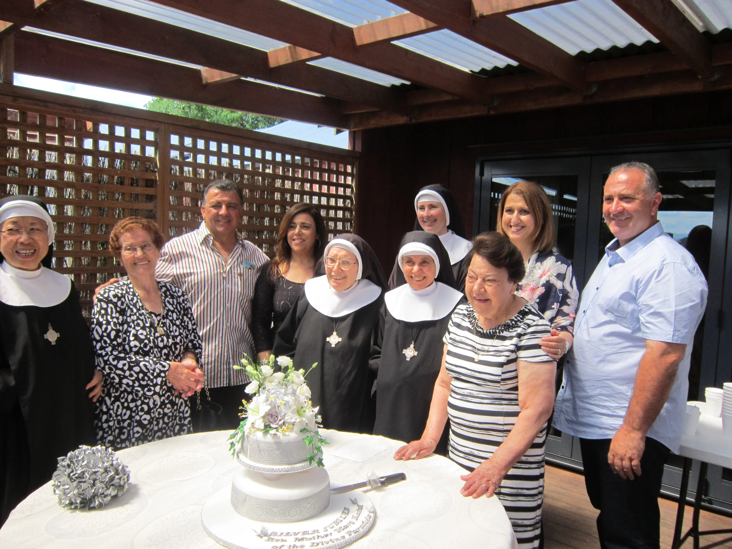 Mother Rachel with some members of her family and community
