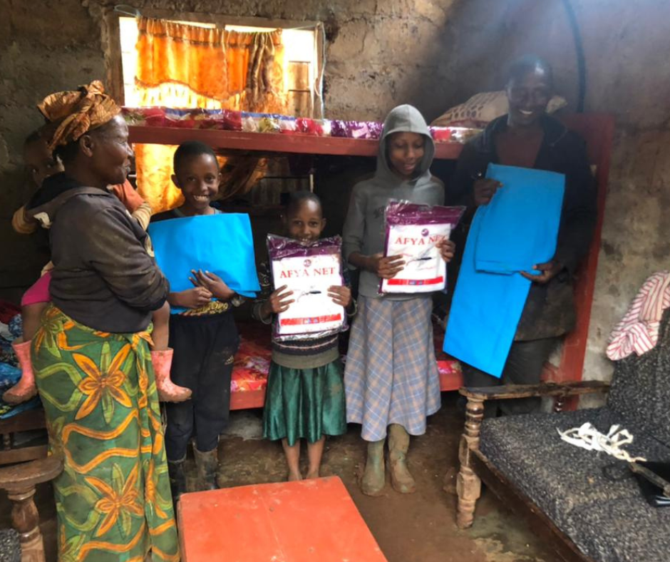 Bed, bedding and mosquito nets £350