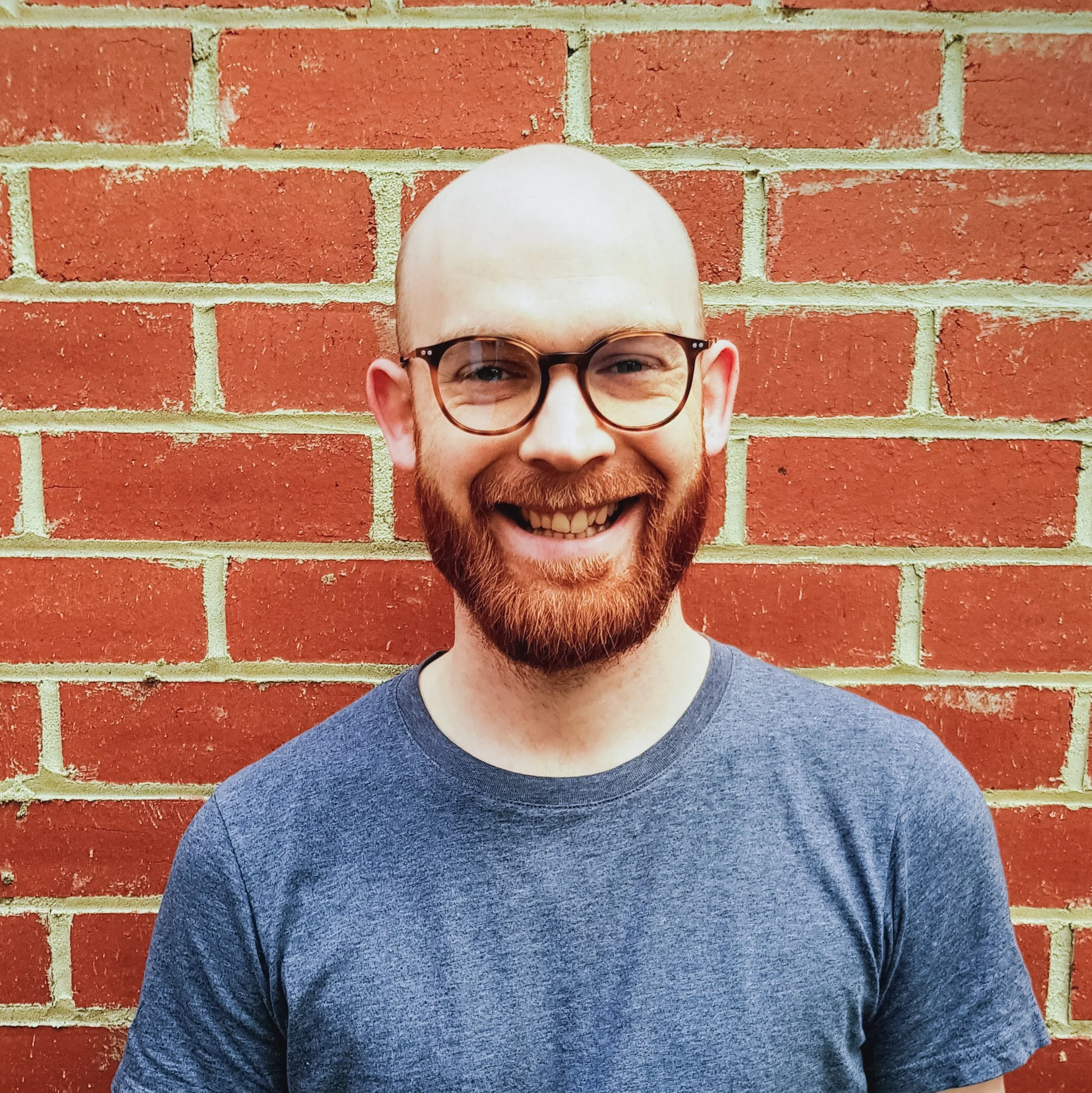 chris barrell headshot brick.jpg