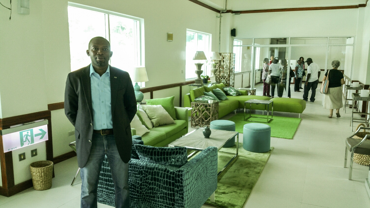 The colour compliments continue into the second lounge with mainly green fabric and reptile like leather lining the accenting couch. Featuring our President of the SVG HTA Fitzroy Glasgow