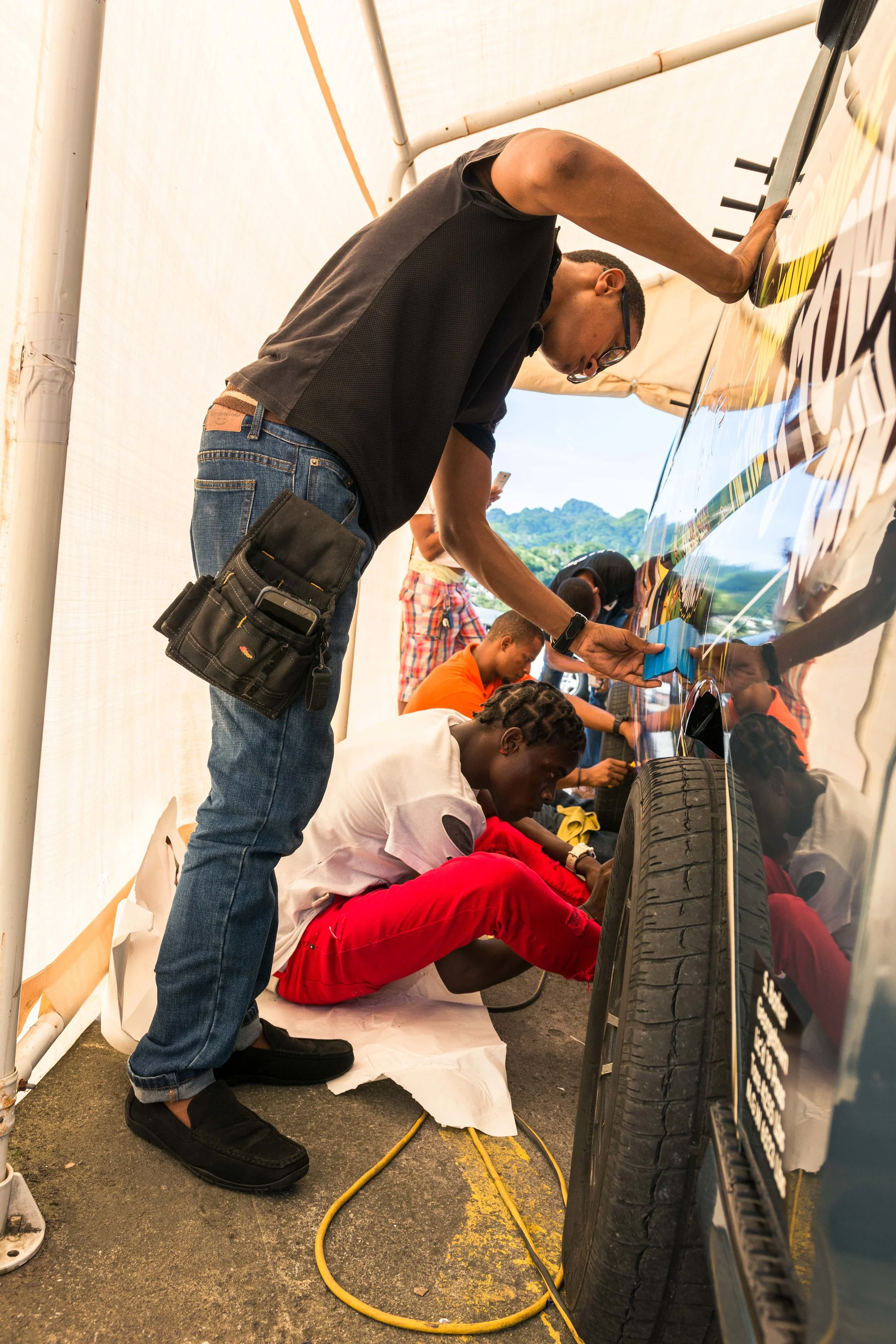 The team works together meticulously tending to each part of the design, making sure that it is finished with the quality they hold to their standard, knowing that each flaw will be scrutinized by the public, their potential customers, and their rivals.