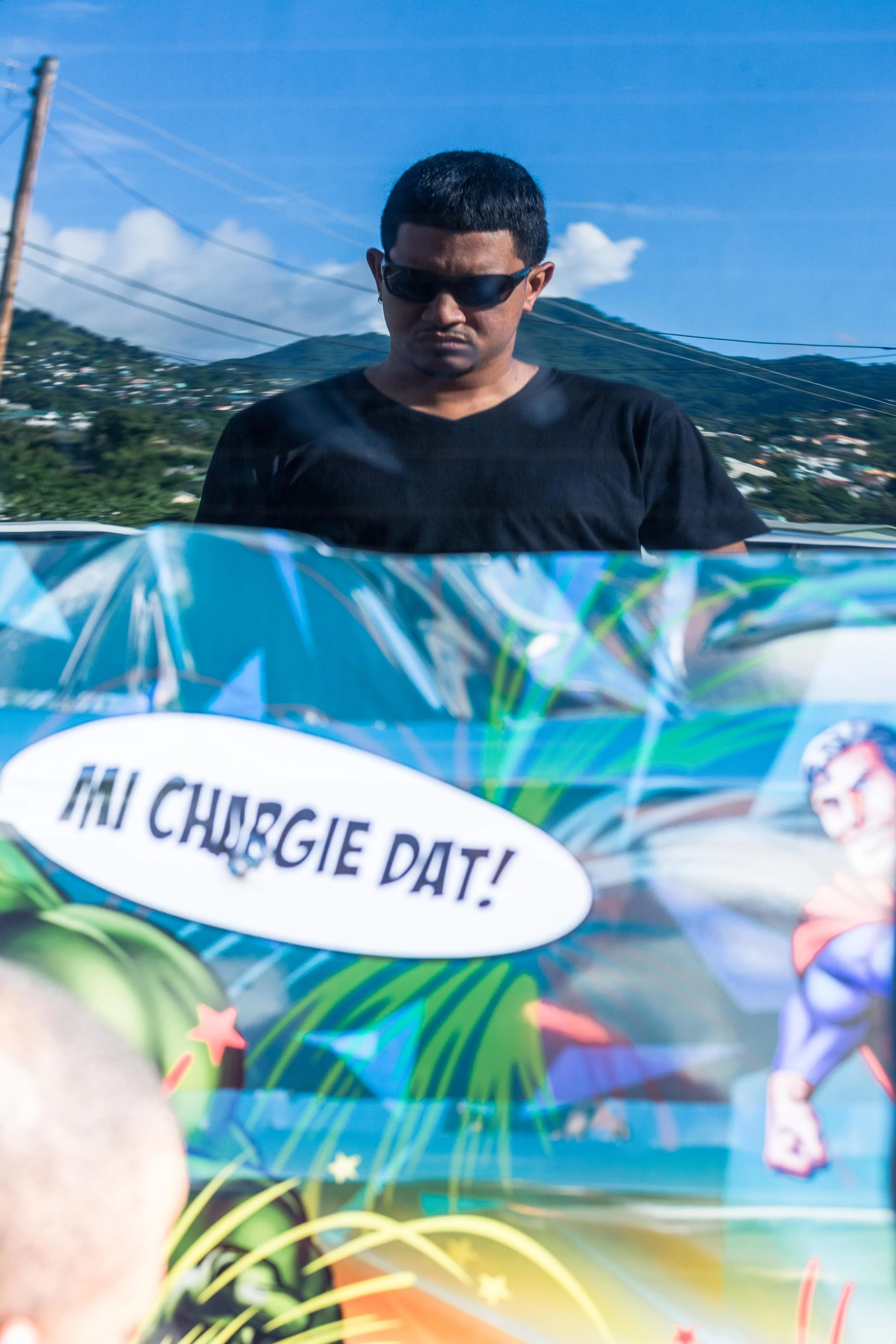 Galdi Neehal - The designer for this van overlooked the application of his work. Albert the owner of the business that wraps the vans (Visu Art Customs) and himself work closely together and have a friendly relationship both as designers. You can read more about Galdi in my previous post on vincy van culture https://www.stephanhornsey.com/blog/2017/2/3/van-culture-in-stvincent-road-warriors-street-performers