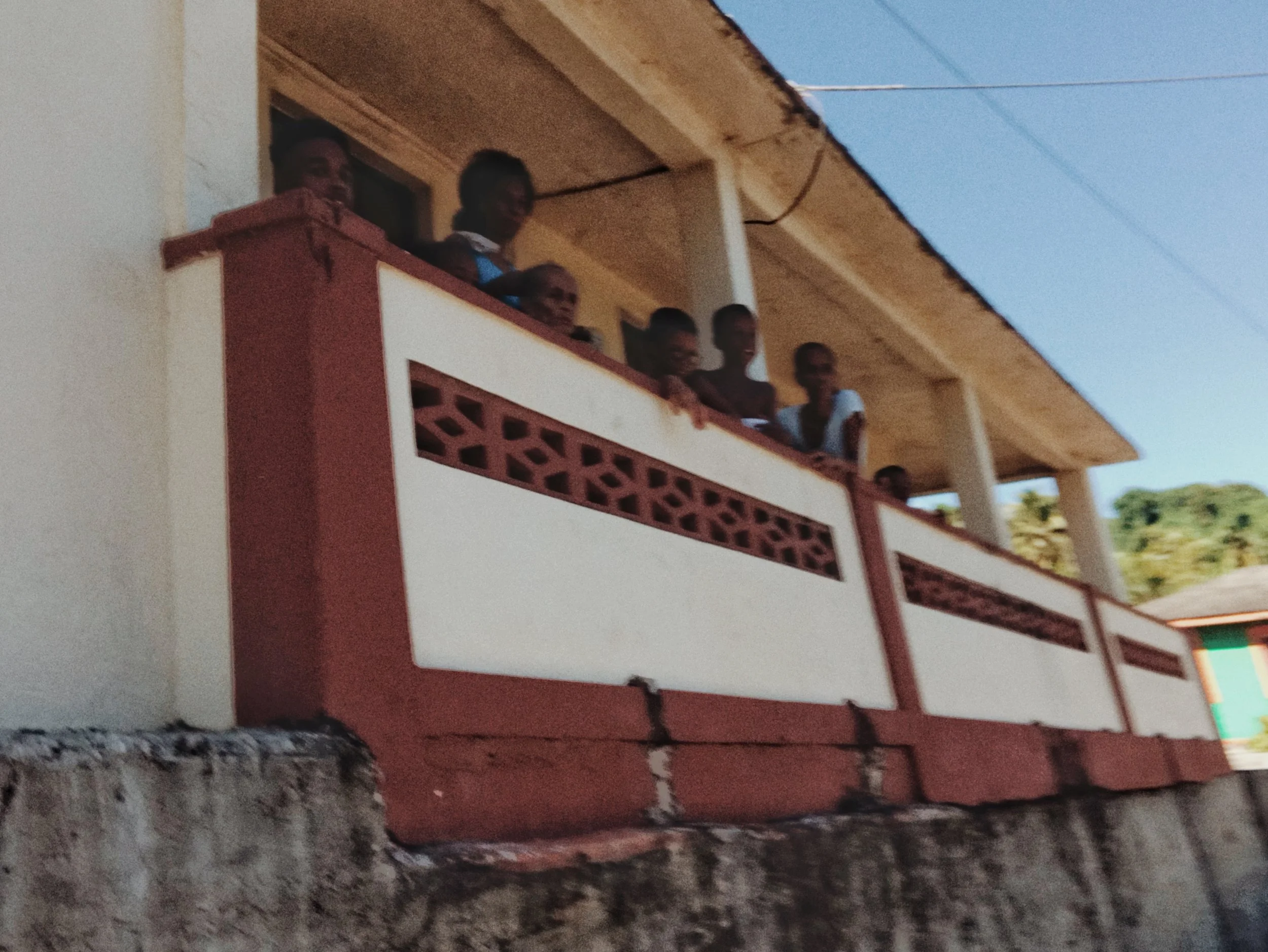 Audience on a Roadside Porch