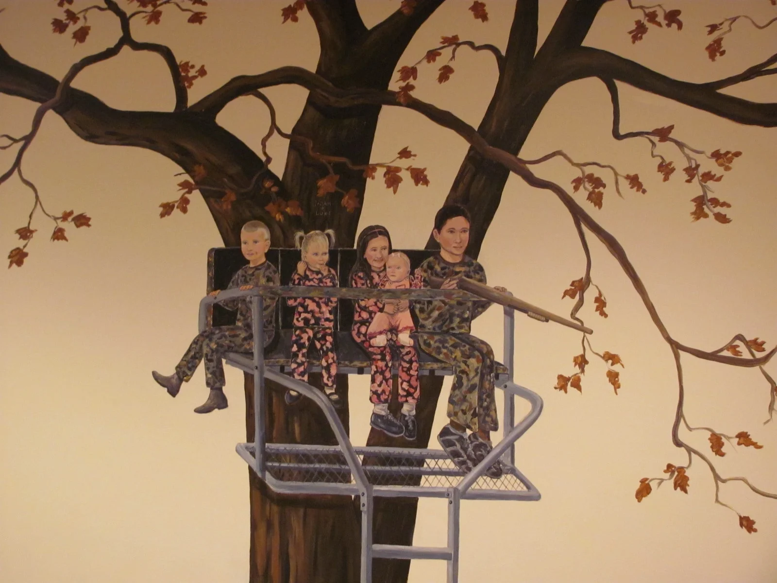 Children wearing camouflage in tree stand.JPG