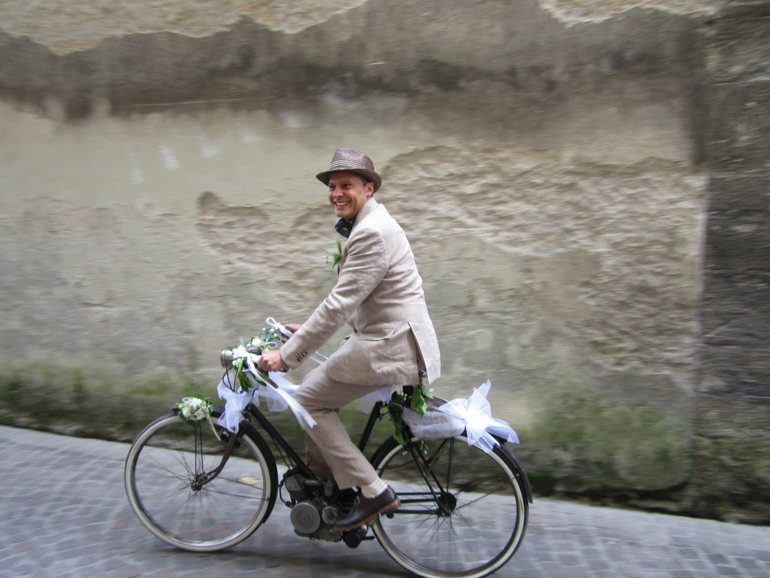 One of my all-time favorite photos - a groom on the way to his spring wedding, Lucca, 2012.