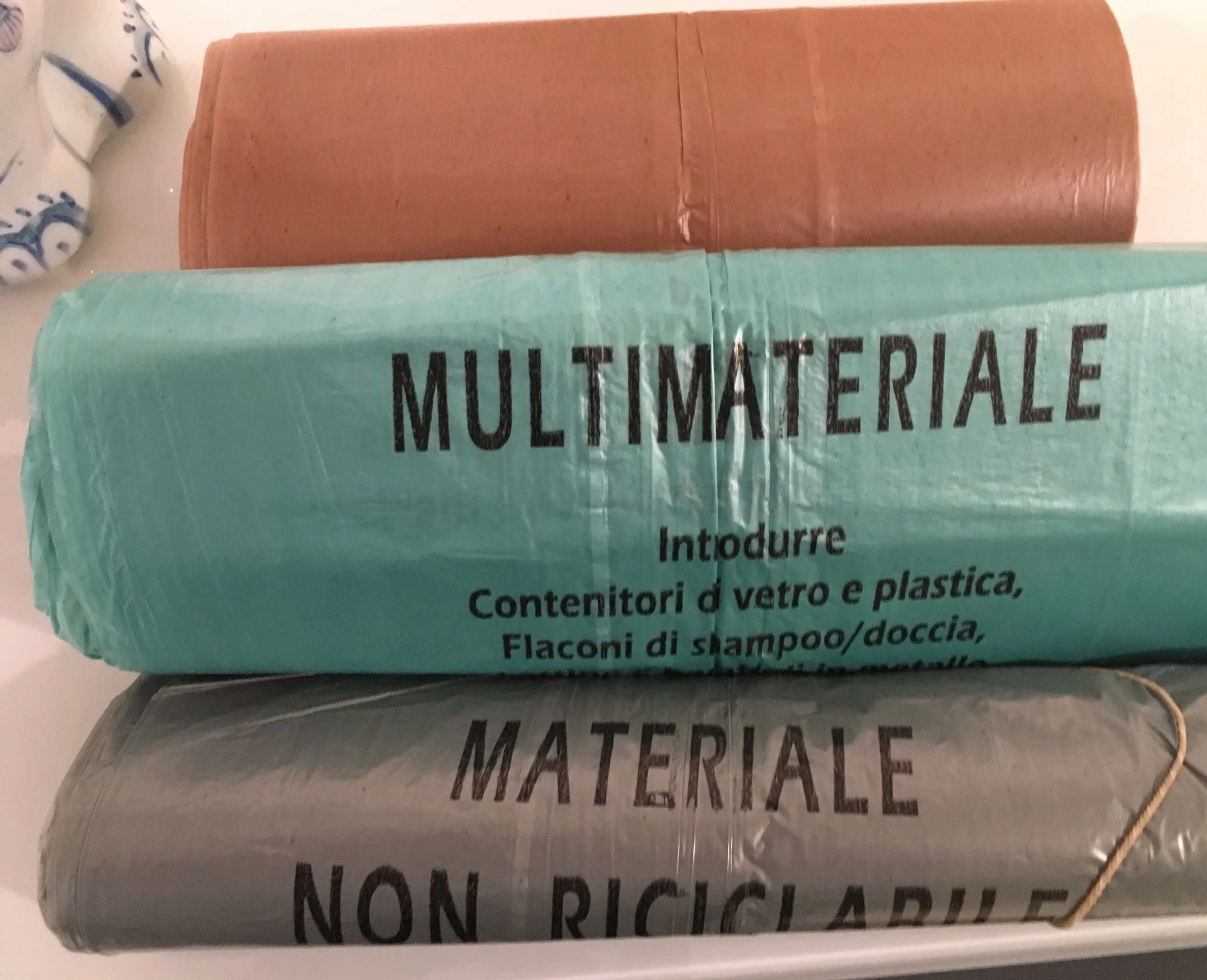 Color coded bags for recycling.