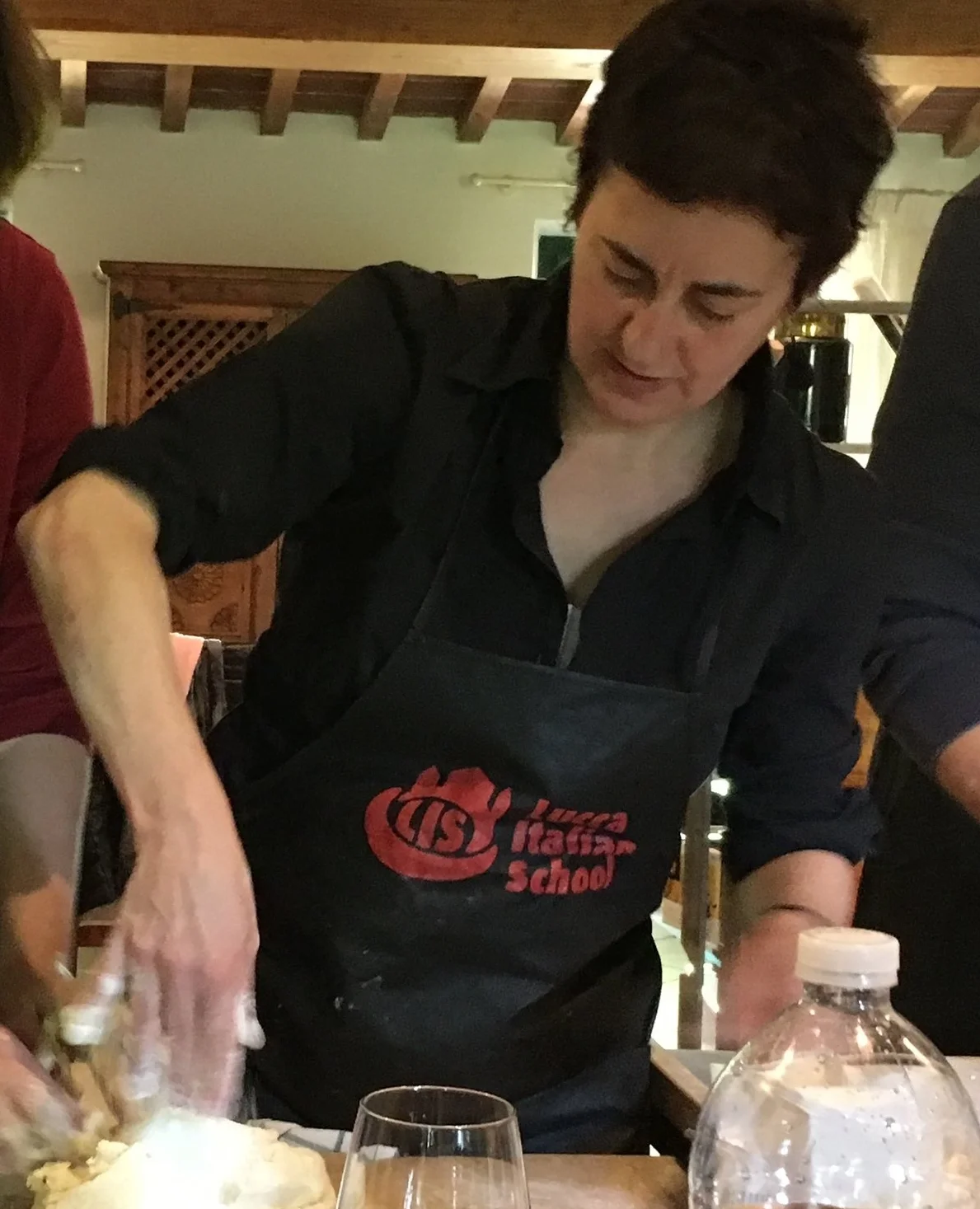 Eva demonstrating the making of gnocchi.