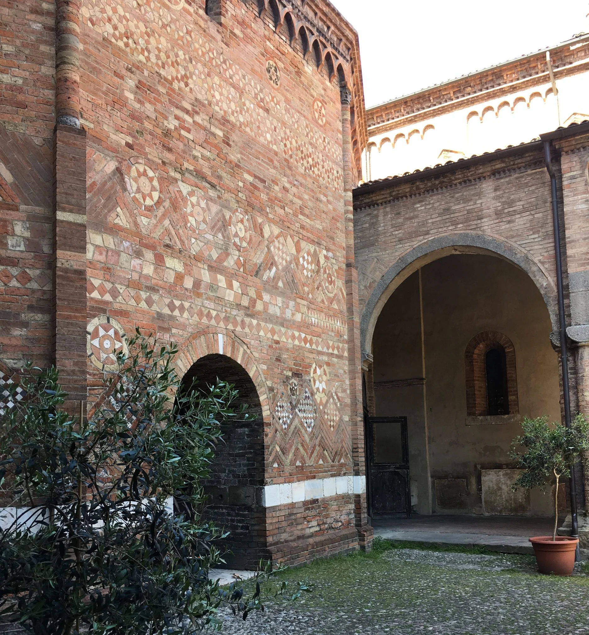 Intricate brickwork in the Pilate's Courtyard, between two of the churches in the Santo Stefano complex.
