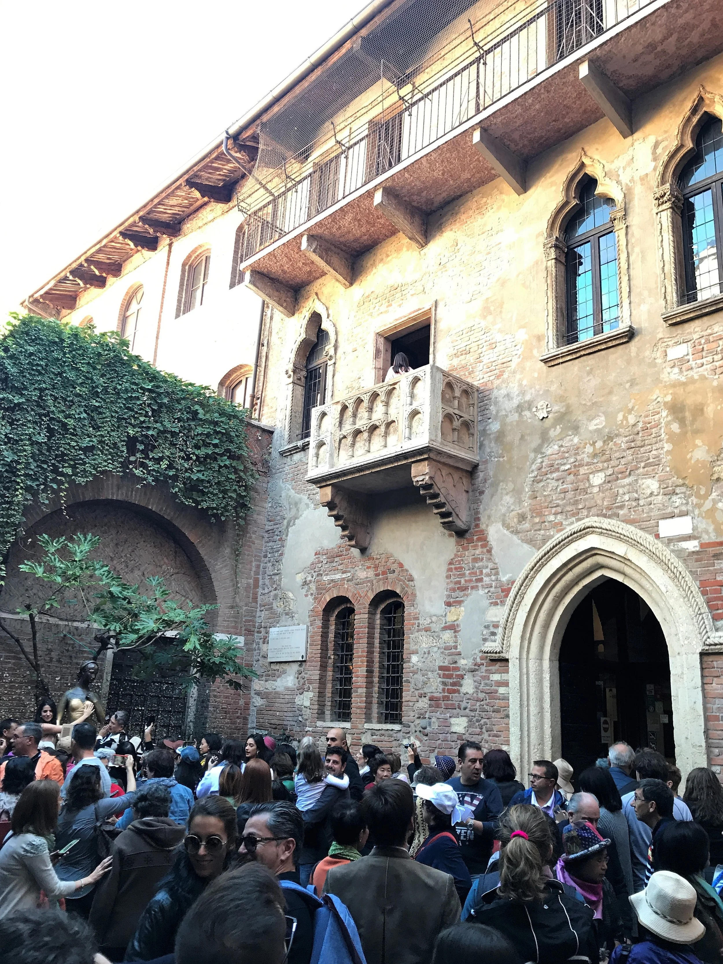 Juliet's balcony in Verona draws crowds of tourists. Many touch the left breast of her statue in the belief that it will make them lucky in love!