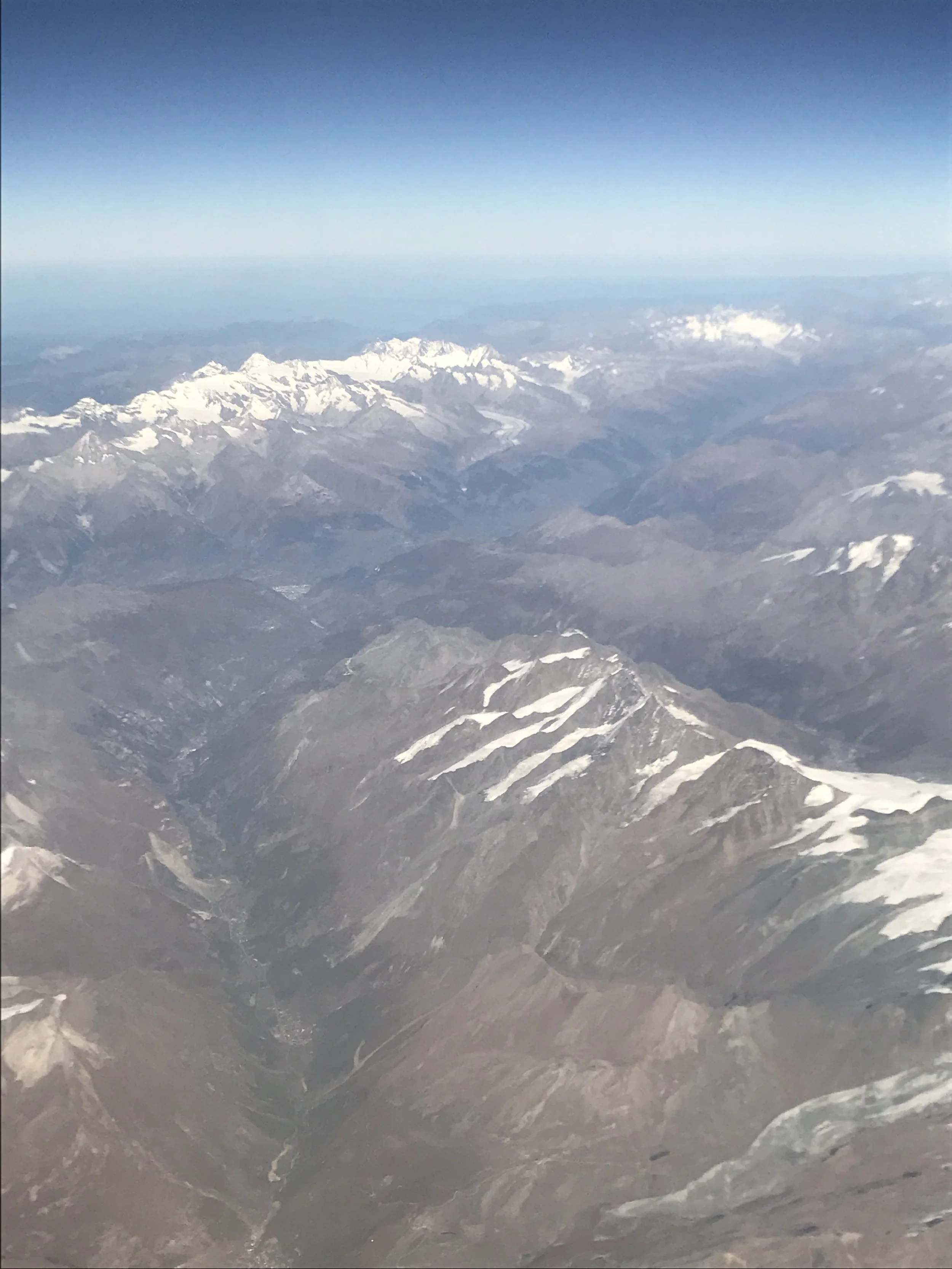 The view from the plane window once I was traveling after being delayed for a day in Italy.