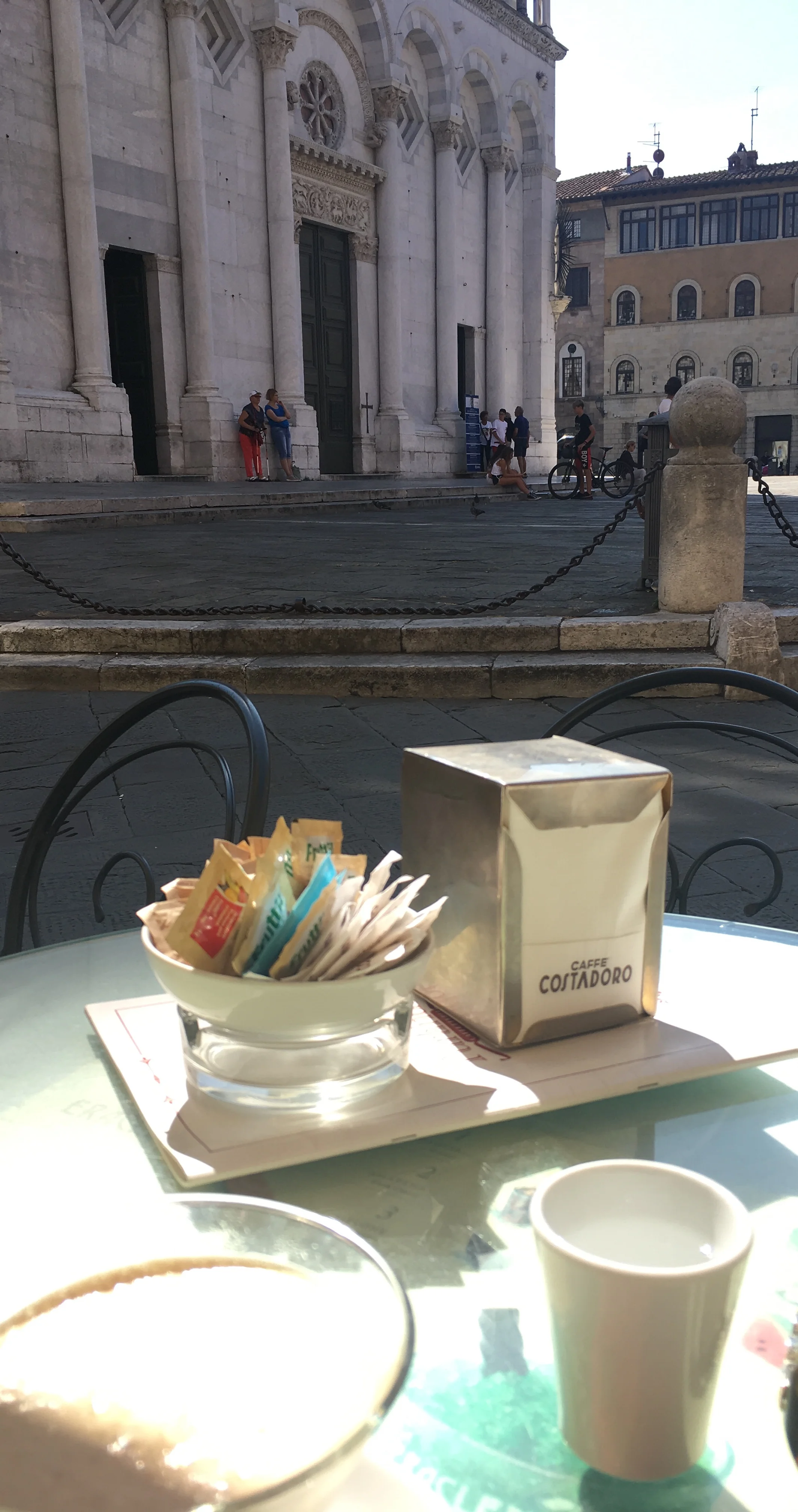 Sipping iced coffee on Piazza San Michele, Lucca