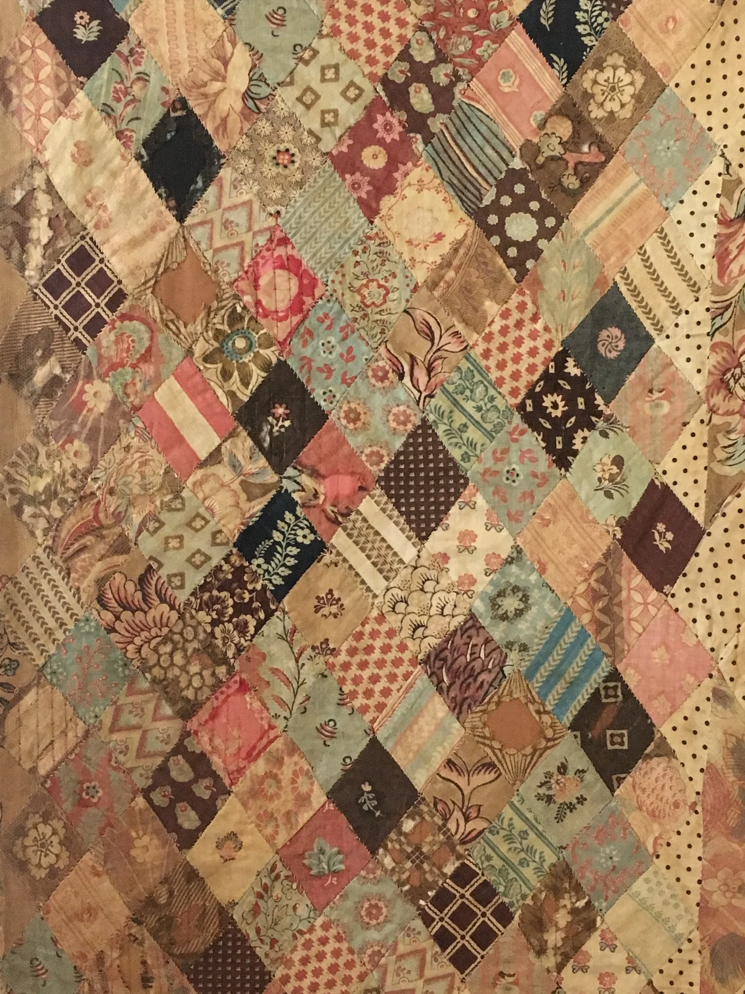 Close-up of the Austen family quilt (actually a coverlet rather than a quilt as it has no batting). The border alone contains 2,500 symmetrical diamond-shaped pieces, all hand-stitched.