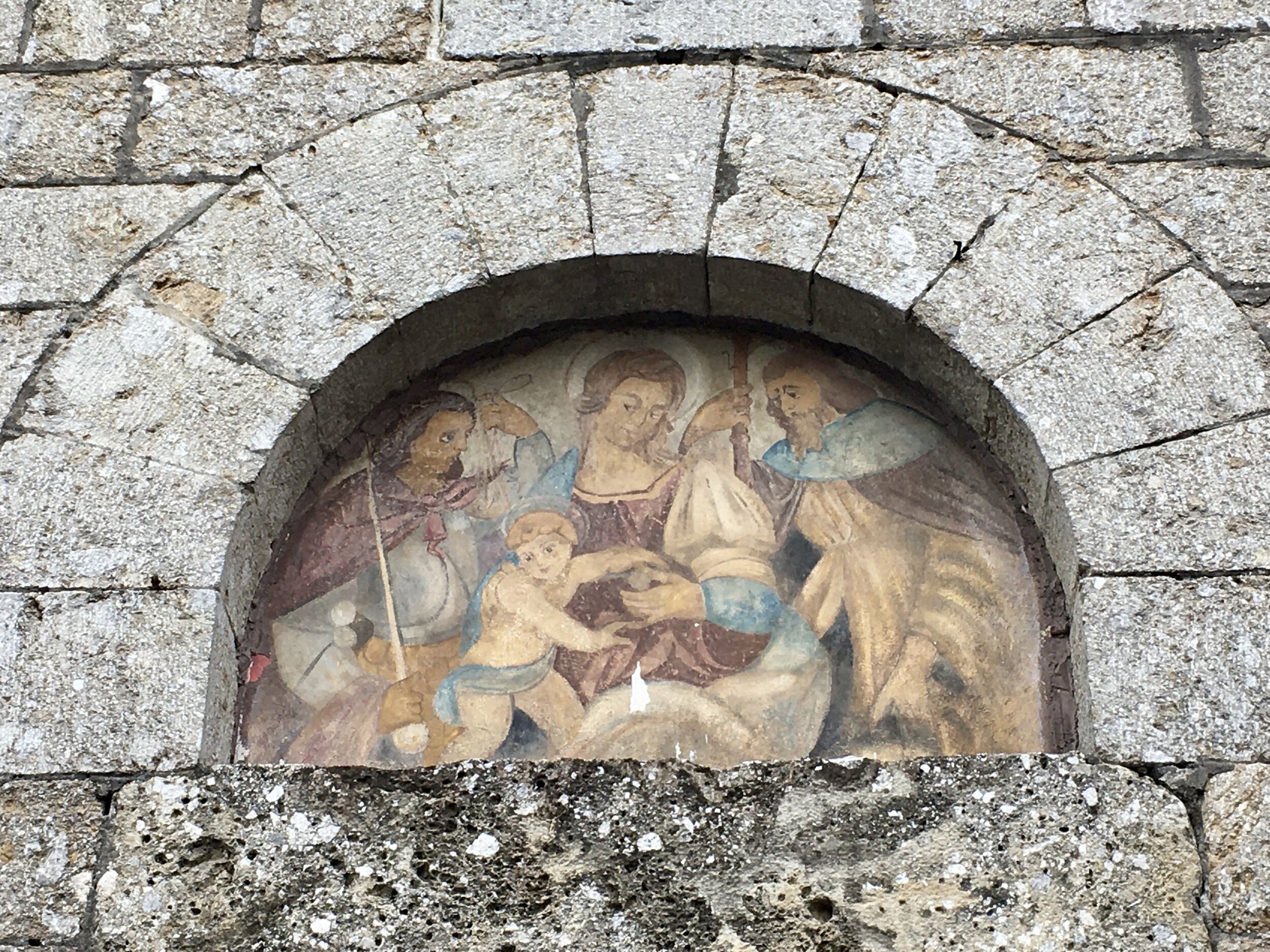 Over the entrance to Chiesa di San Michele Arcangelo