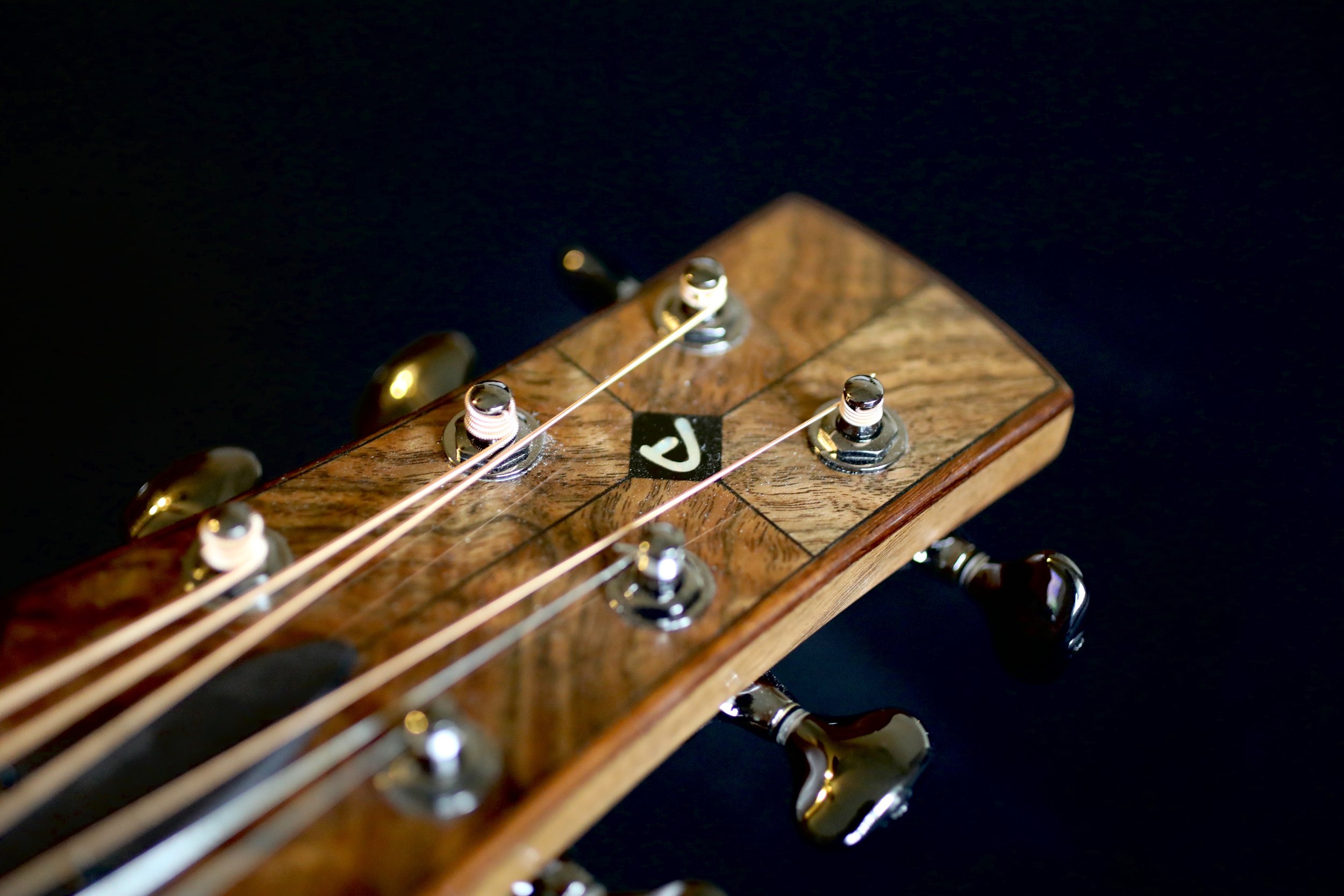 Four-Way Bookmatched Headstock with Decorative Binding