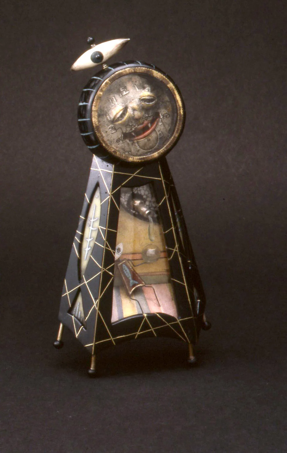 “MCM” 1992 Mixed-media brooch #1620 5" x 2 1/2" x 3/4" Collection of Museum of Arts and Design, New York, NY