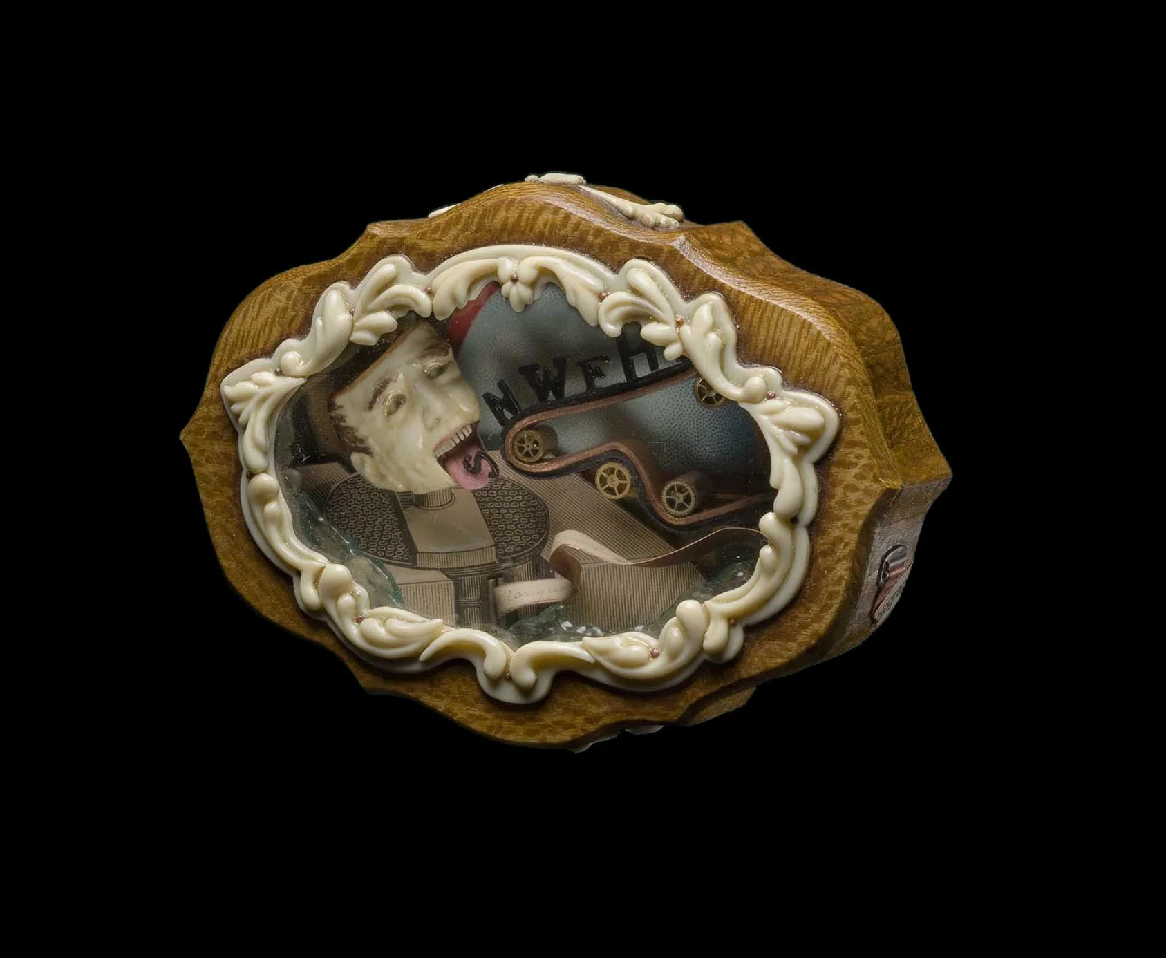 “Autobiography” 2001 Mixed-media brooch #1713 2 7/8" x 4" x 1" Collection of Tacoma Art Museum, Tacoma, WA