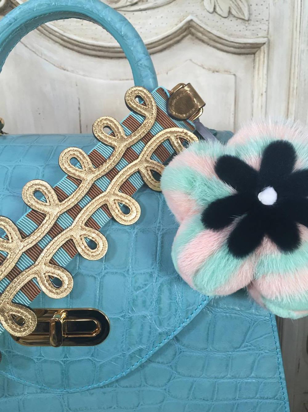 The KAC Annabelle with a Fendi strap and charm. 