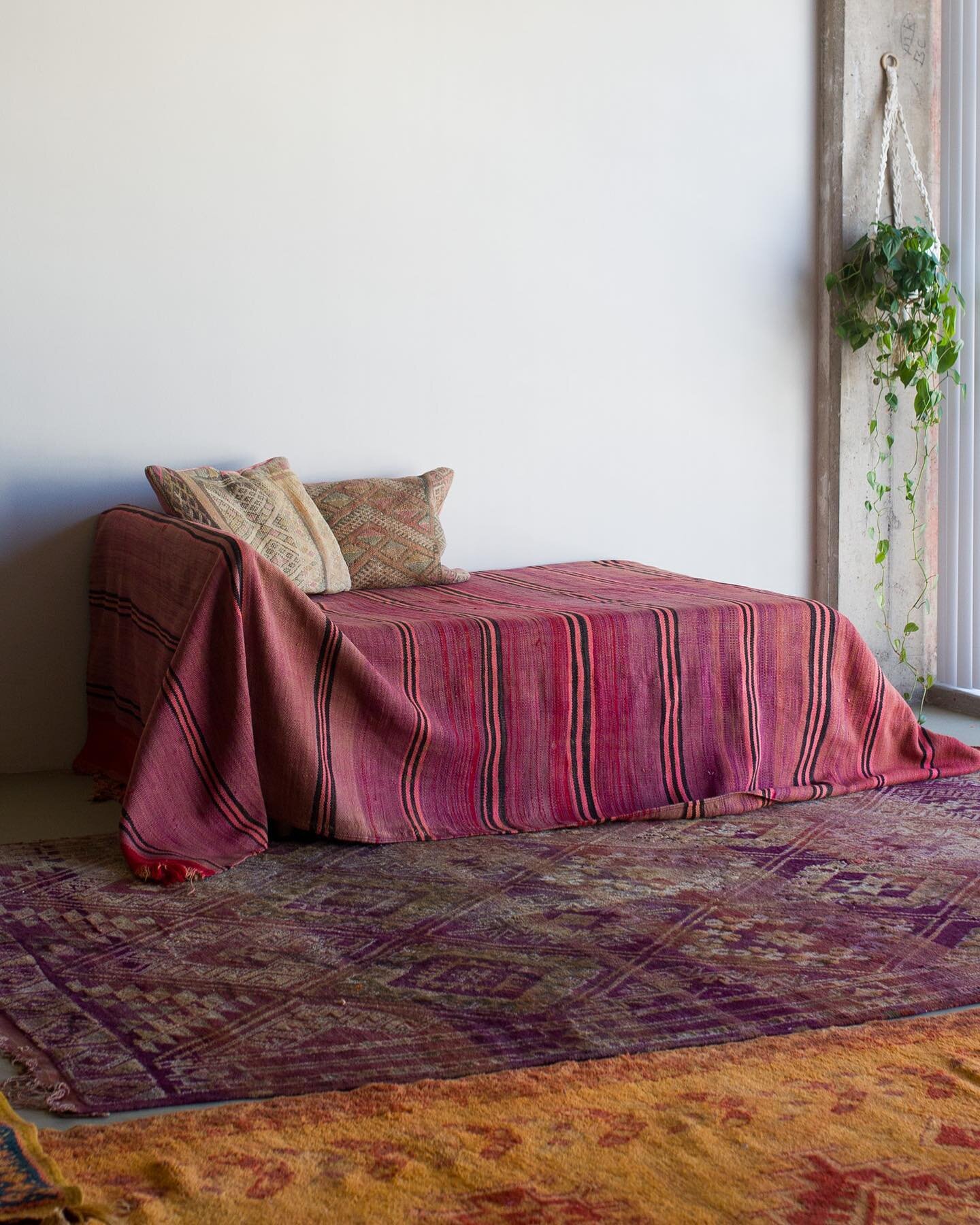 My new space can now accommodate laying so many rugs on the floor!  This one is a vintage beni m&rsquo;guild and in a purple that is rarely seen in my collection and looks beautiful paired with the reds and purples in the kilim! 💜 &hearts;️