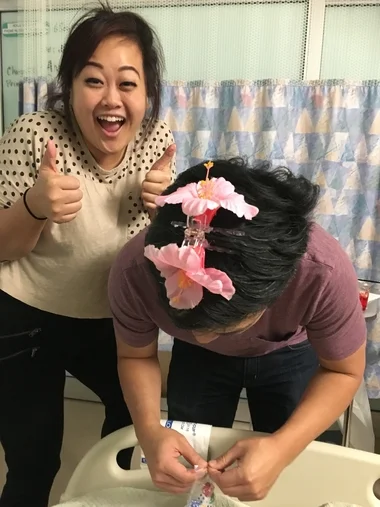 TIM SHOWING OFF THE LOVELY FLOWER HAIR CLIP THAT CONNIE GAVE ME :D. 