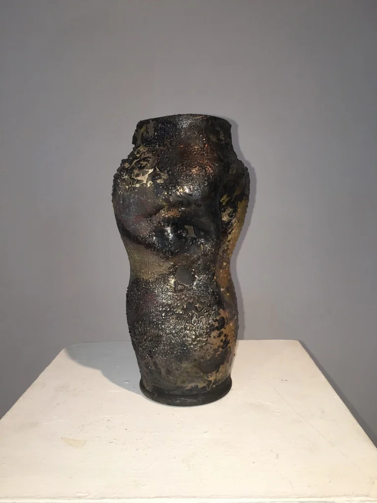 Late and simpler raku with far too much glaze but overall a nice form 1 