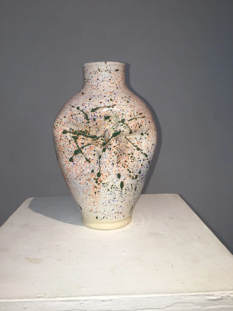 Mature expression of splatter-spritz concept on elegant form 1