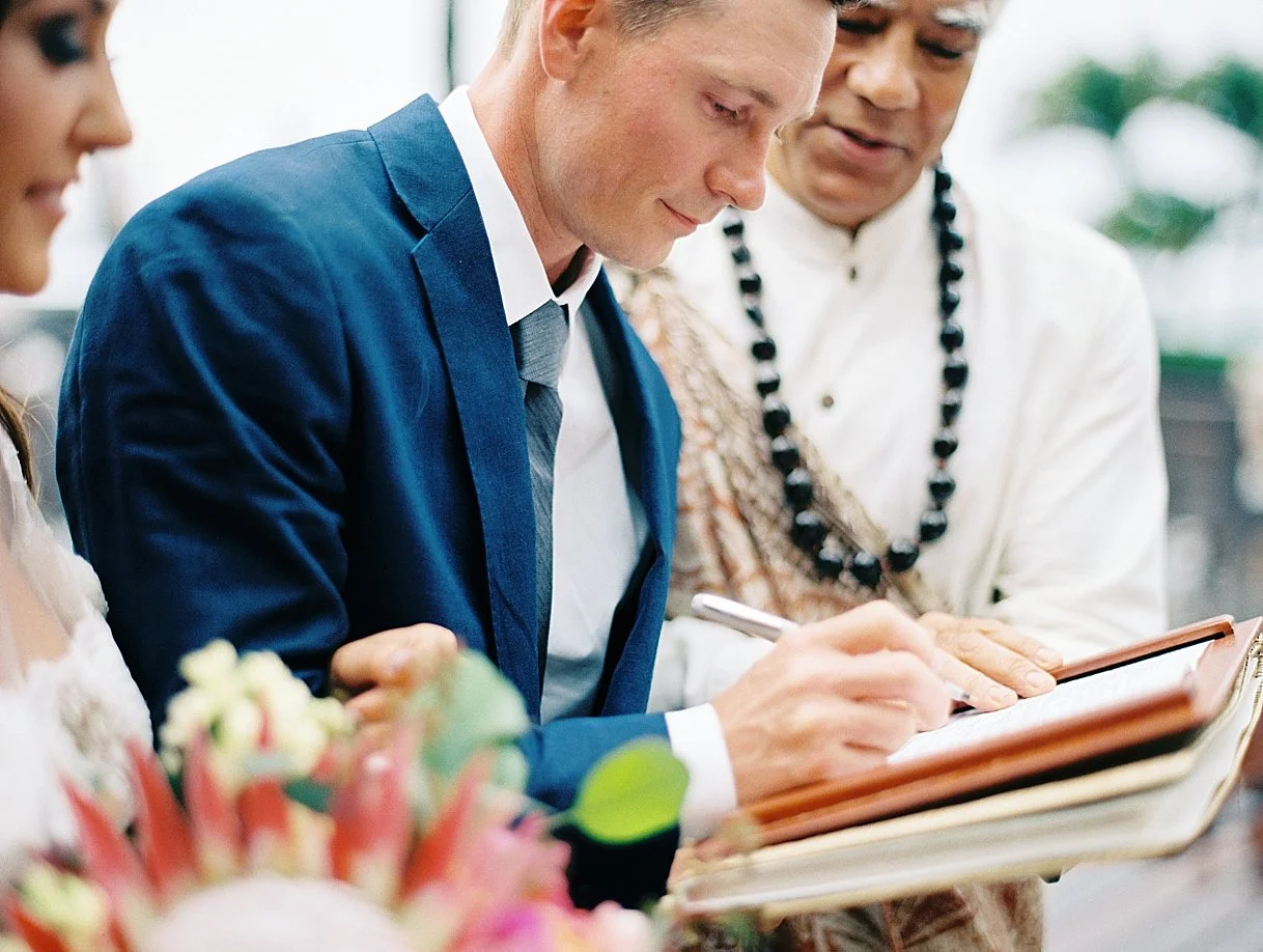 groom-signing-marriage-license.jpg