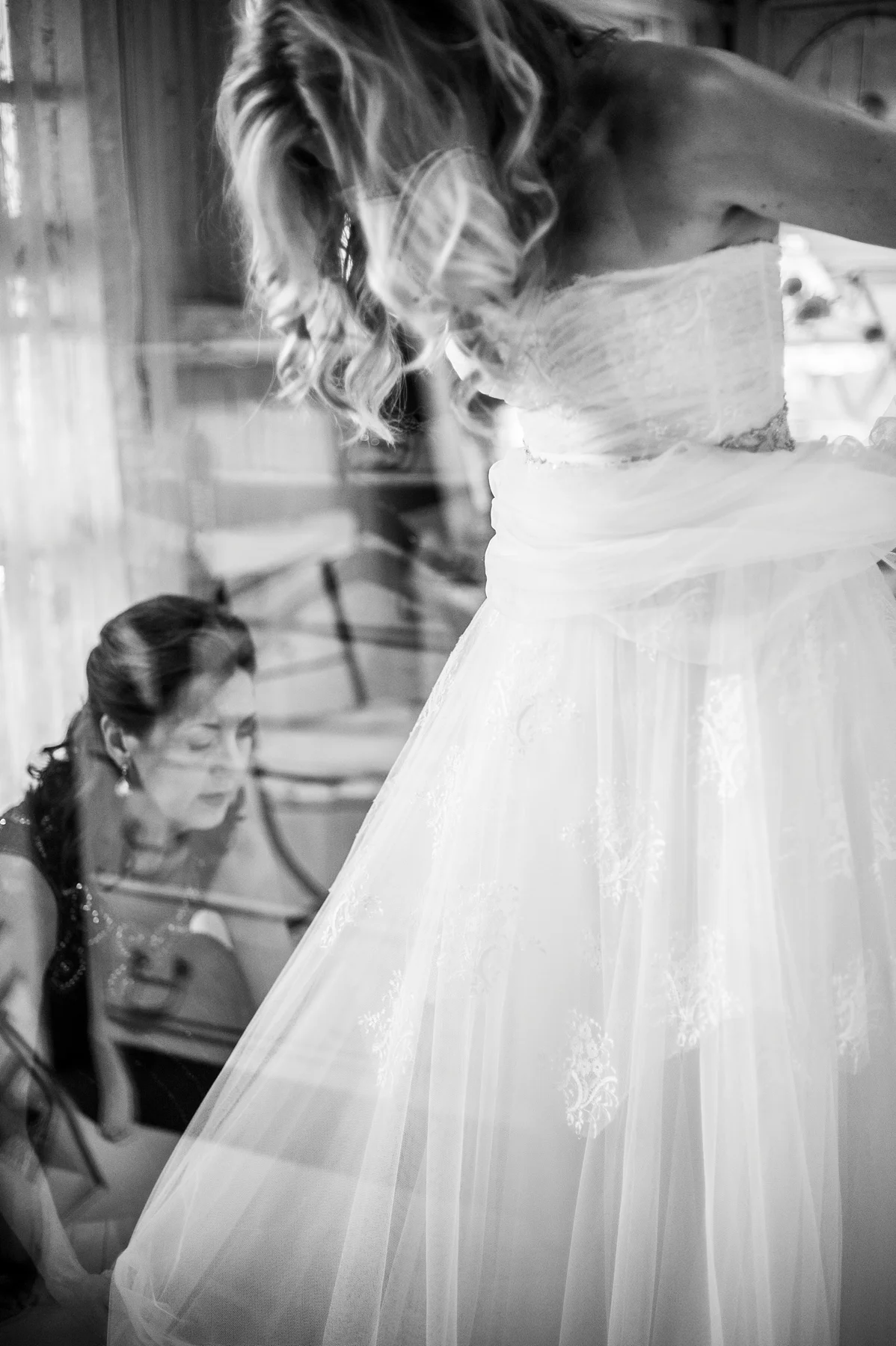 4-bride-getting-ready-through-window.jpg
