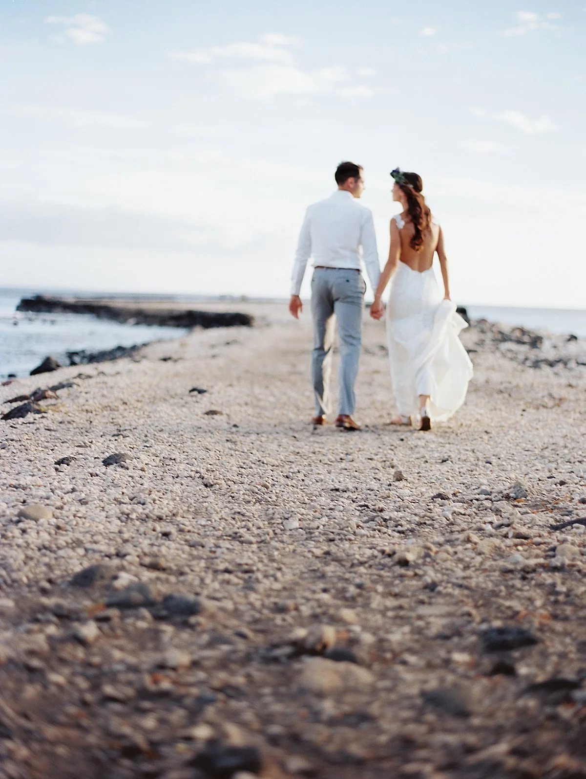 64-bride-groom-beach-walking.jpg