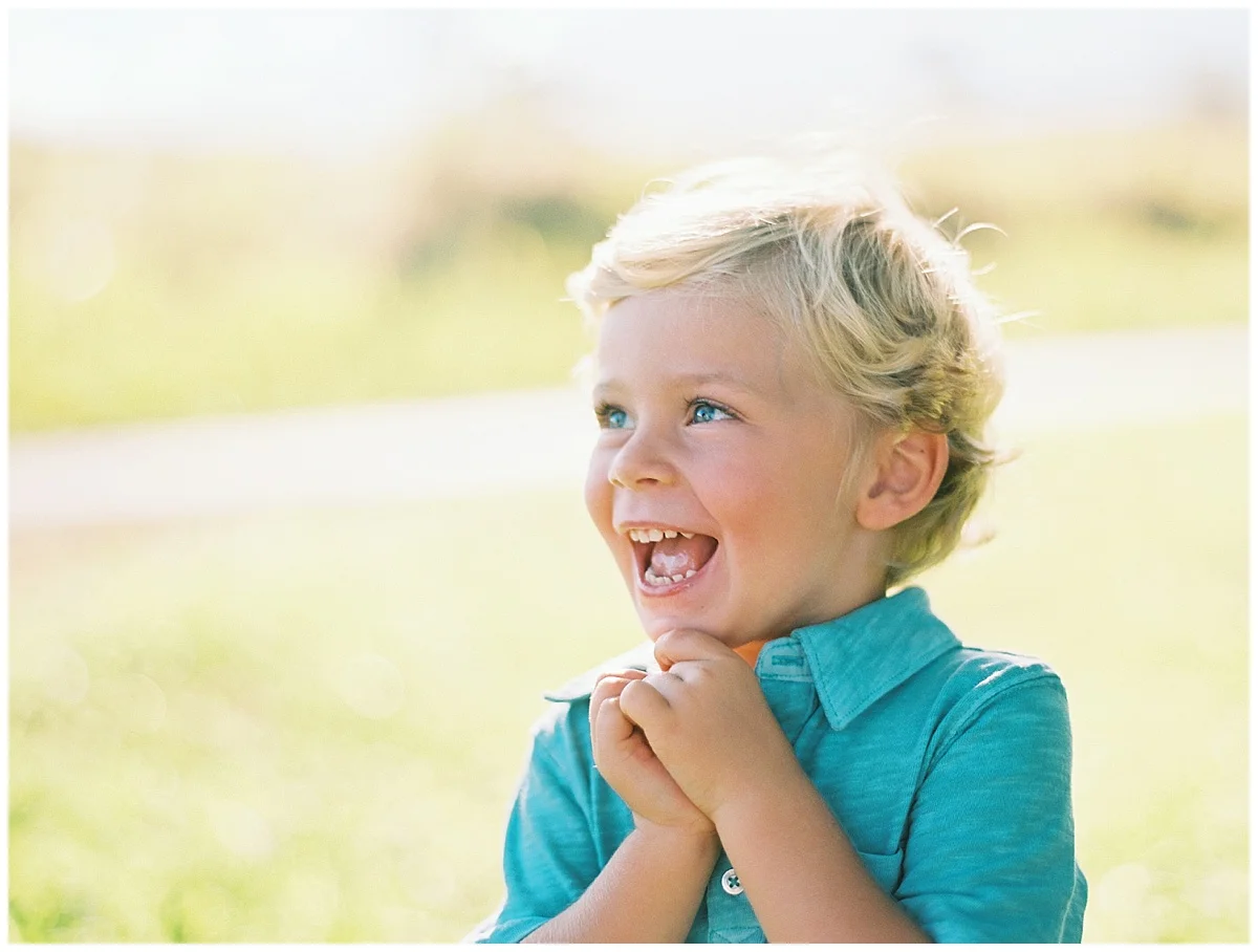 maui-child-photographer-adorable-blue-eyed-boy-laughing