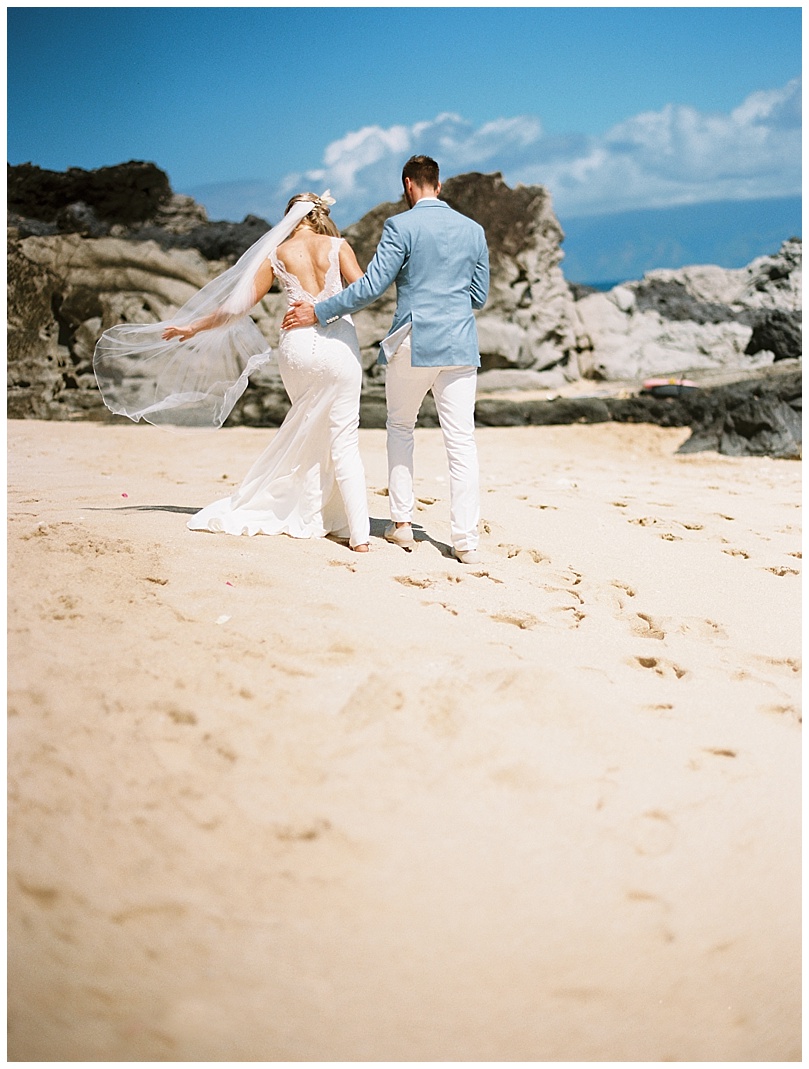 ironwoods-beach-elopement-maui-bride-groom-walking-romantic