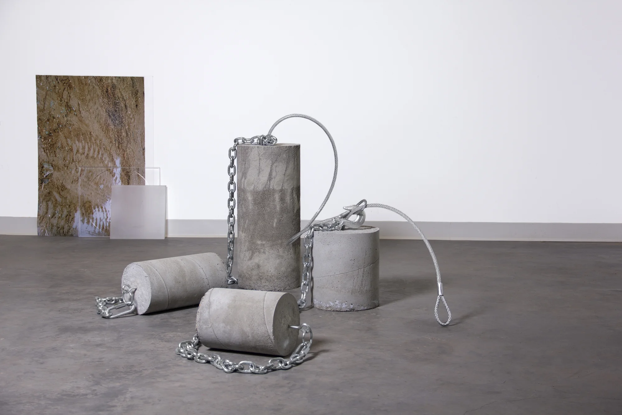 Performance I: Chained Cement, Dirt and Acrylic, 2019