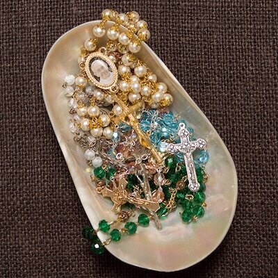 Shell Dish full of Rosaries