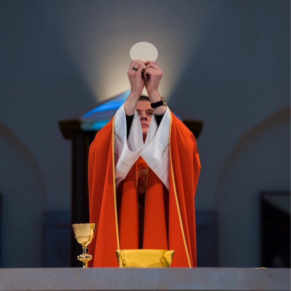 A Priest during Holy Communion