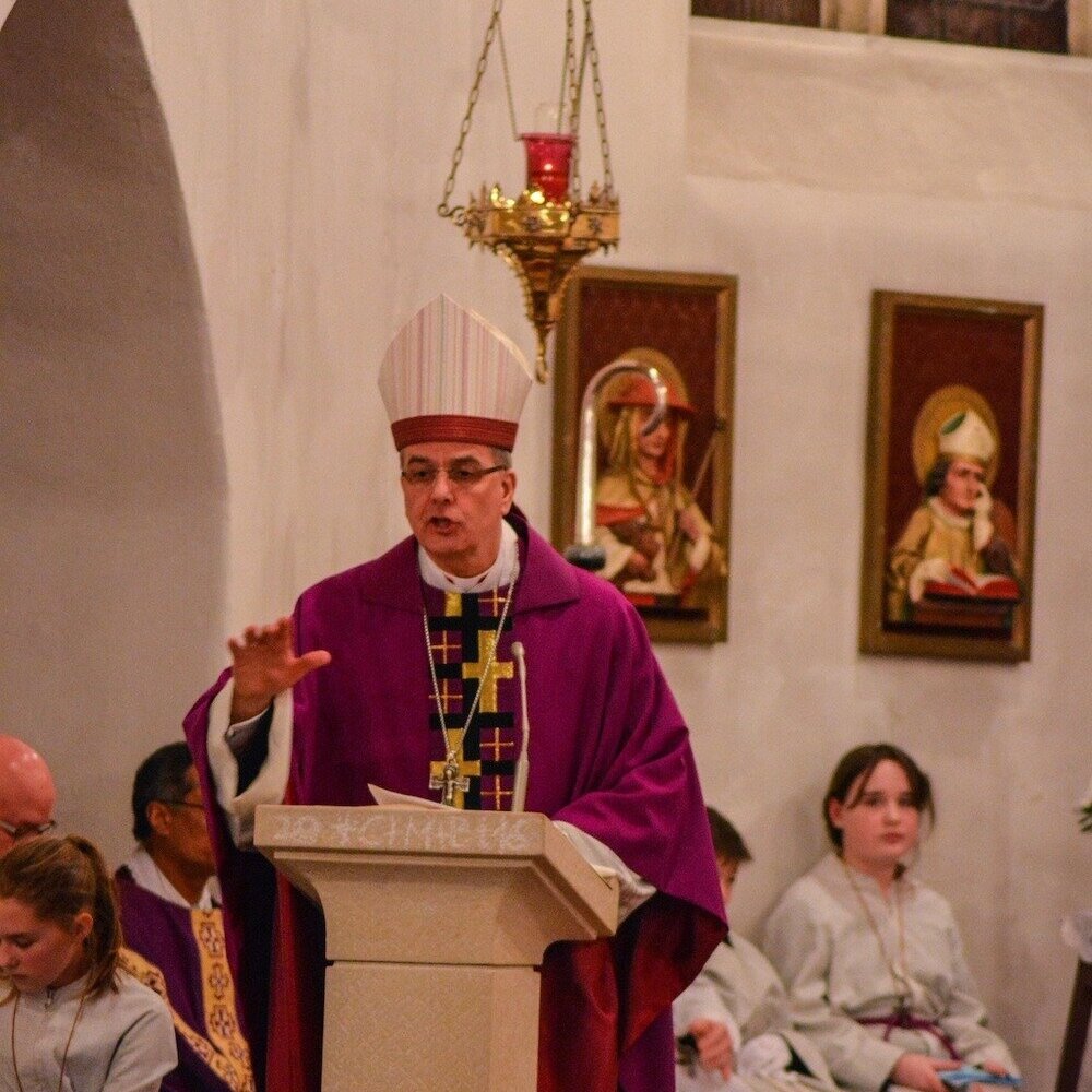 Bishop giving the Homily at Mass