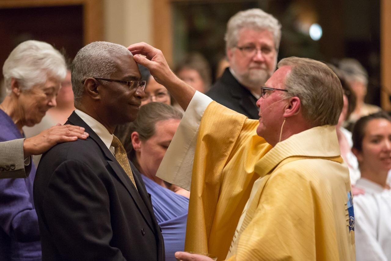 Priest giving a Blessing