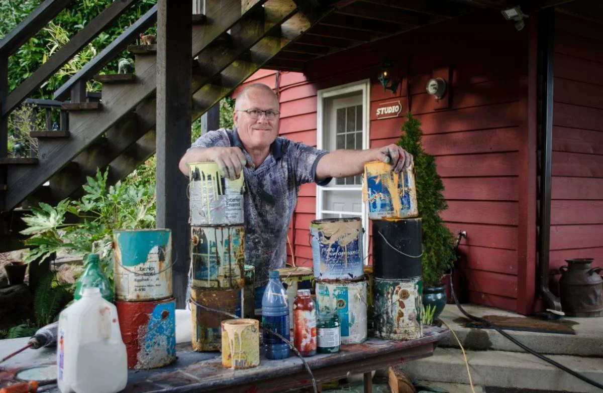 B.C. artist Jan de Beer with upcycled paint.